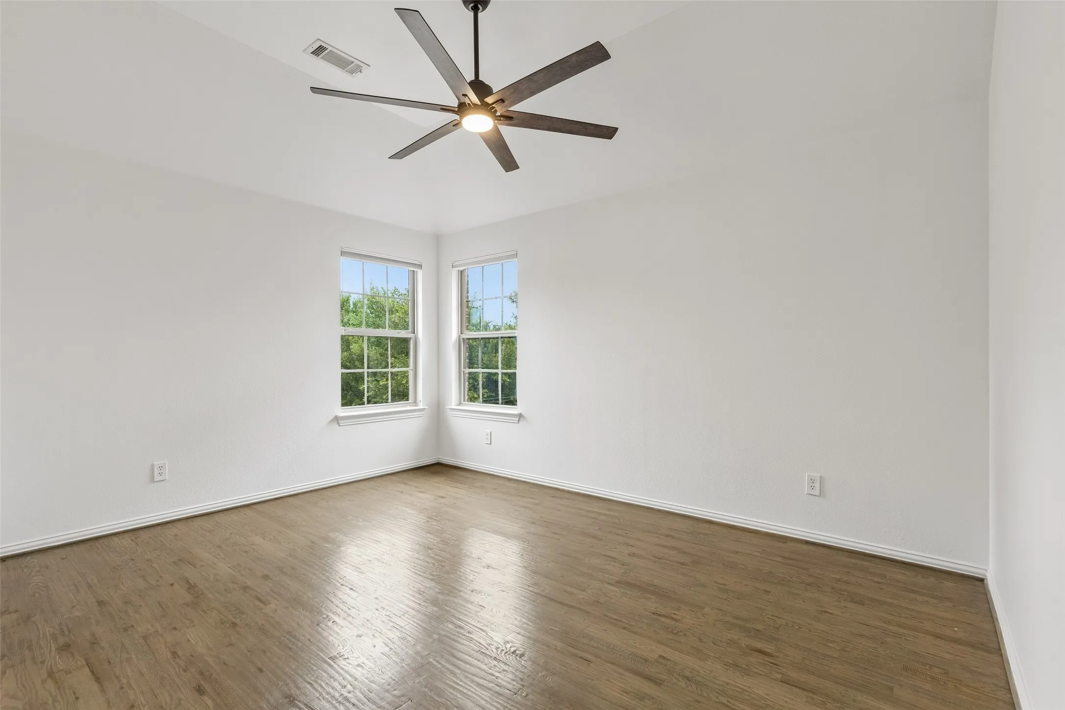 2nd level guest bathroom with refinished hardwood floors, custom closet, and renovated en suite bathroom with walk in shower.