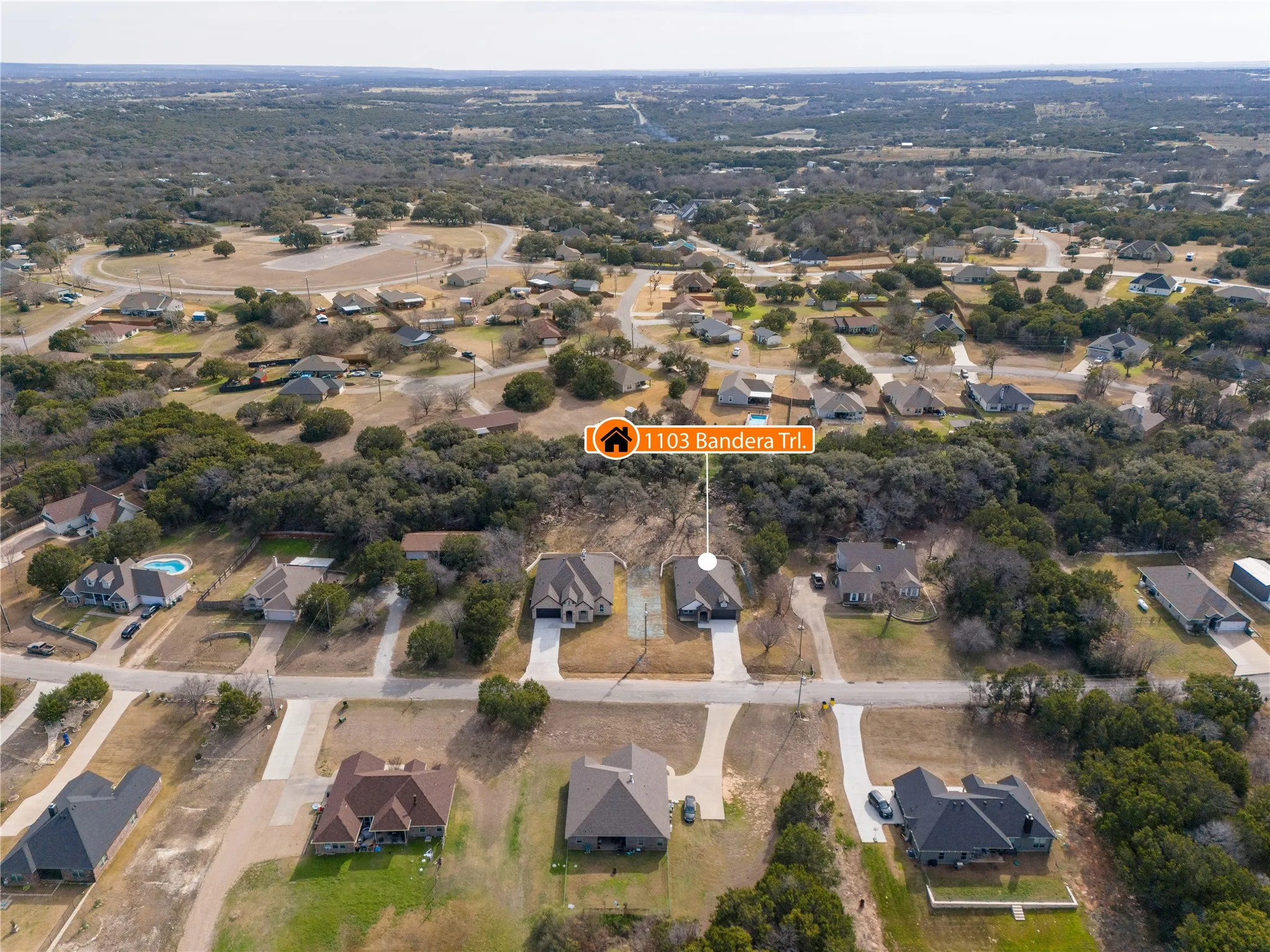 Aerial perspective showcasing a residential neighborhood with varied architectural styles