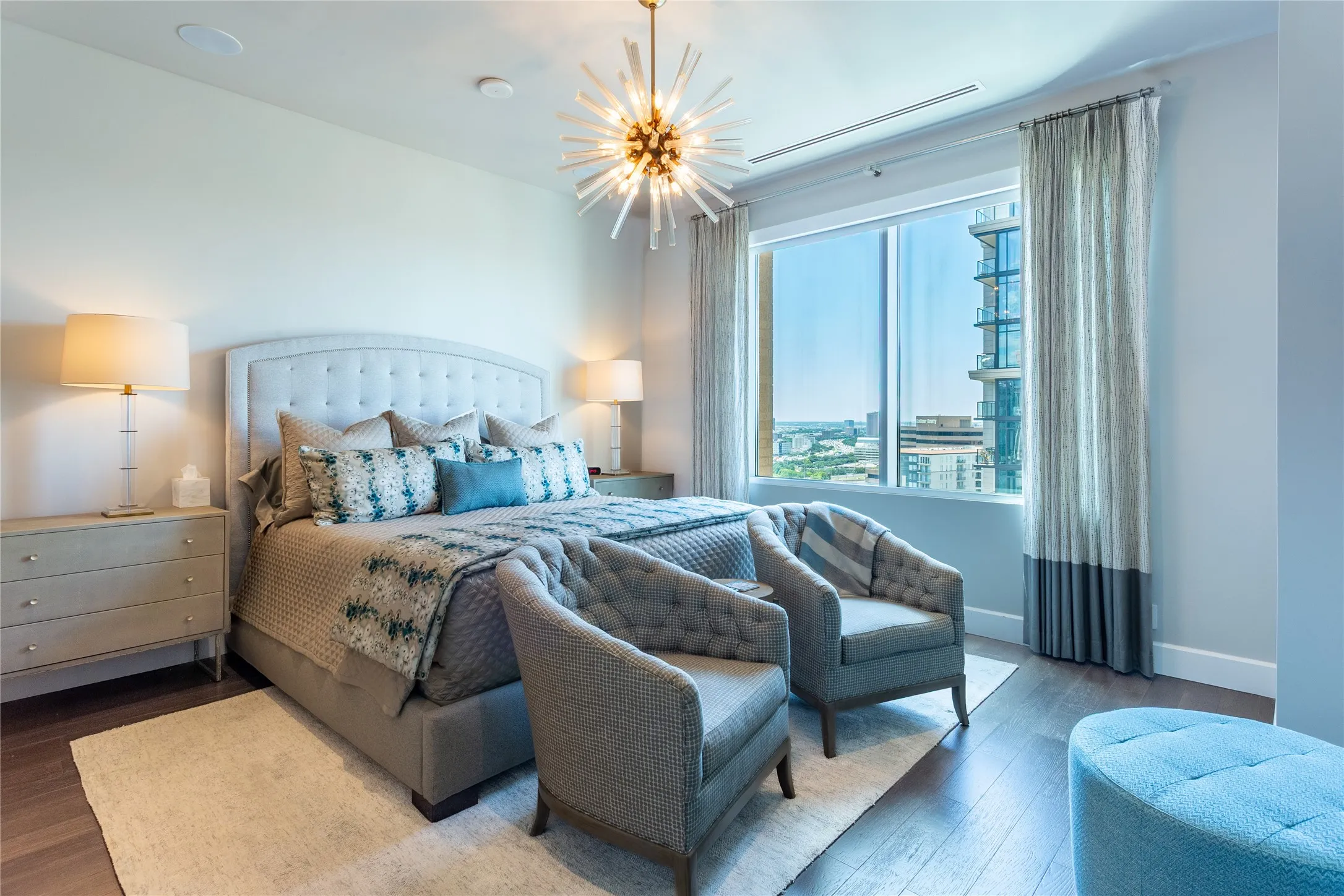 Primary has automated channeled Lutron blackout shades & designer light fixture.