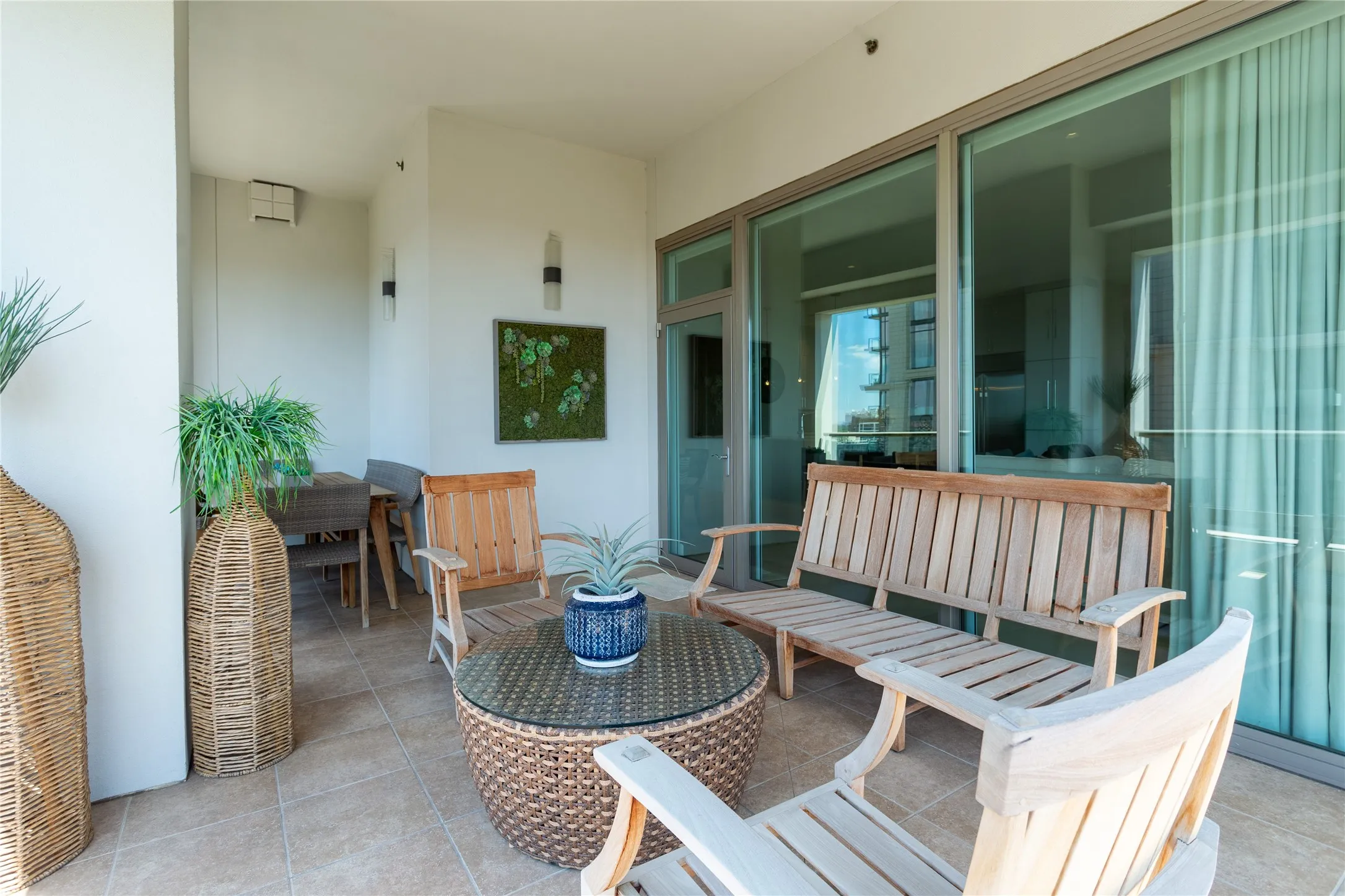 Large protected Balcony roomy enough for seating & dining.