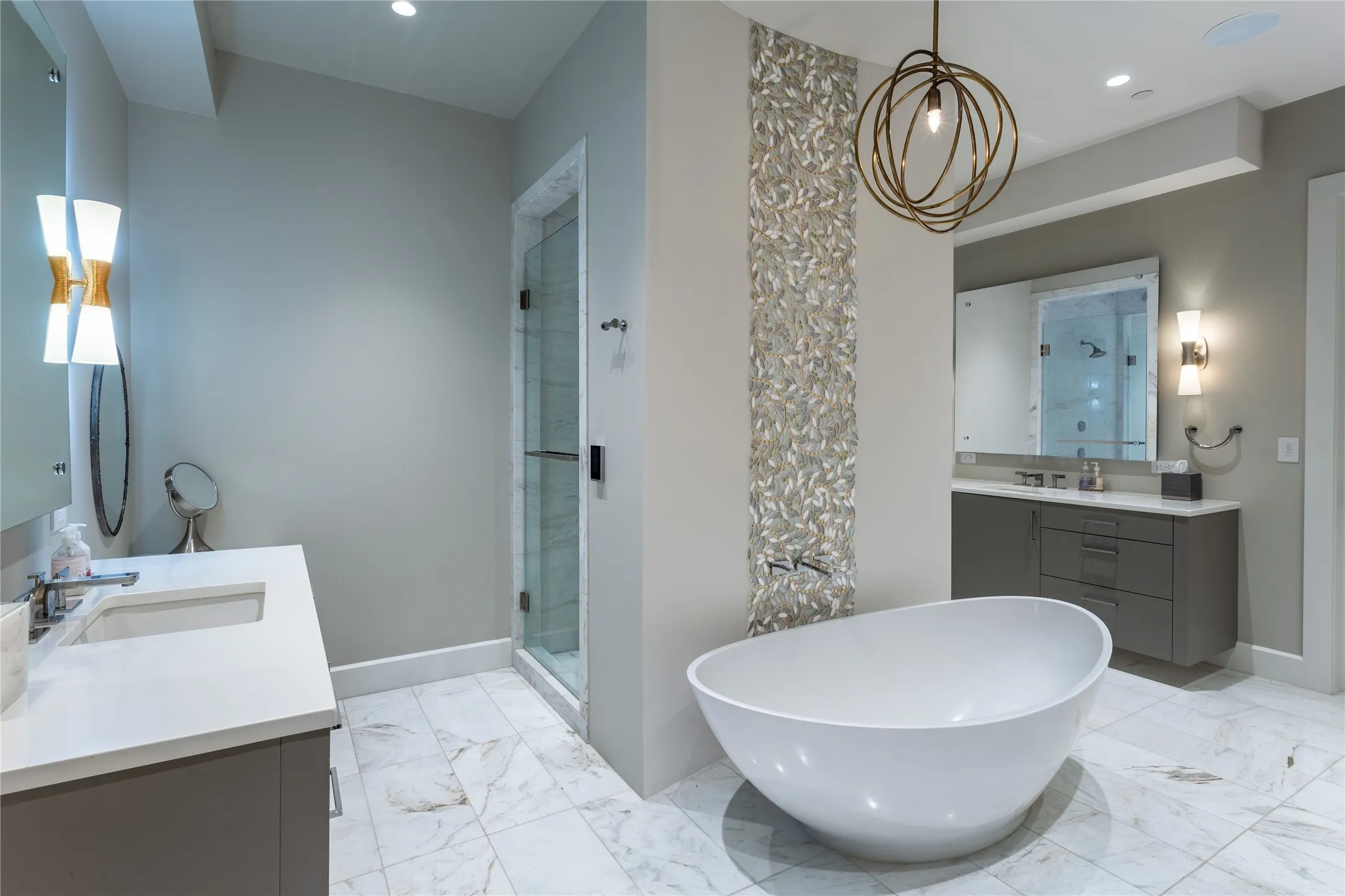 Primary Bath offers Daphne White Marble counters, backsplash & flooring + Bentwood cabinetry.