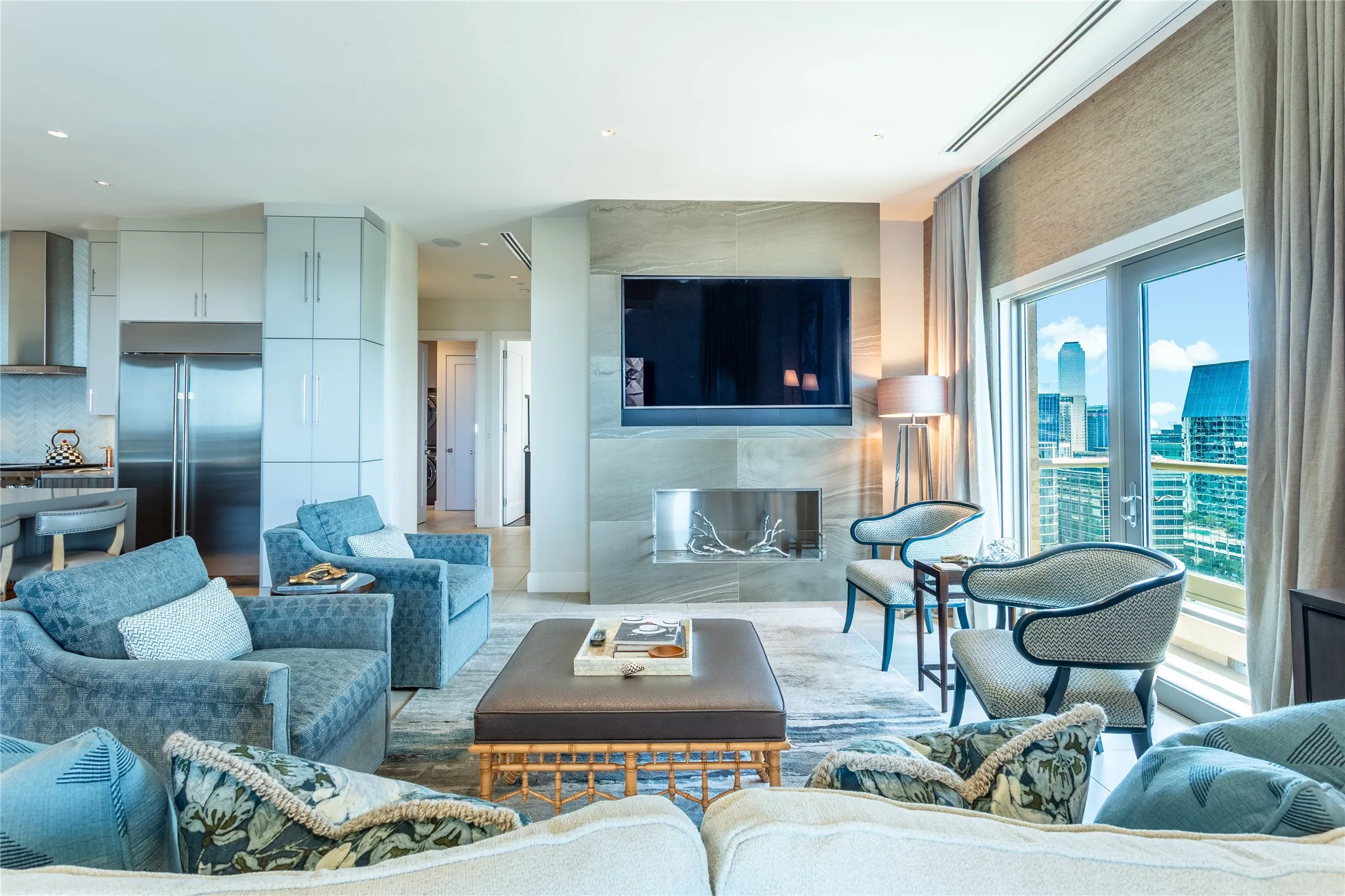 Limestone Fireplace wall with 100" TV inset.