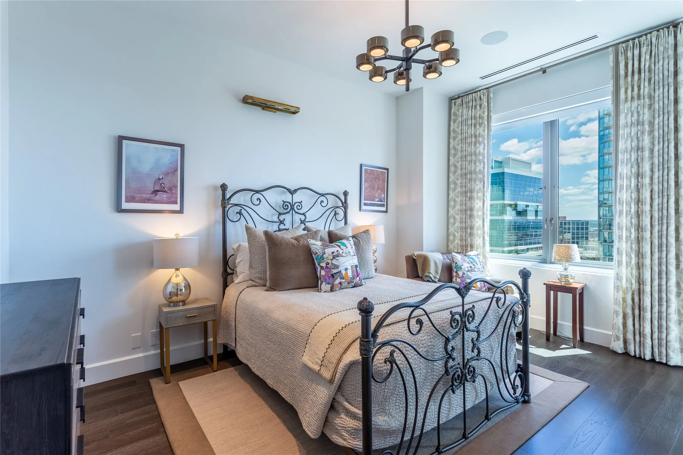 Split Guest Suite has city views & Lutron channeled blackout shades.