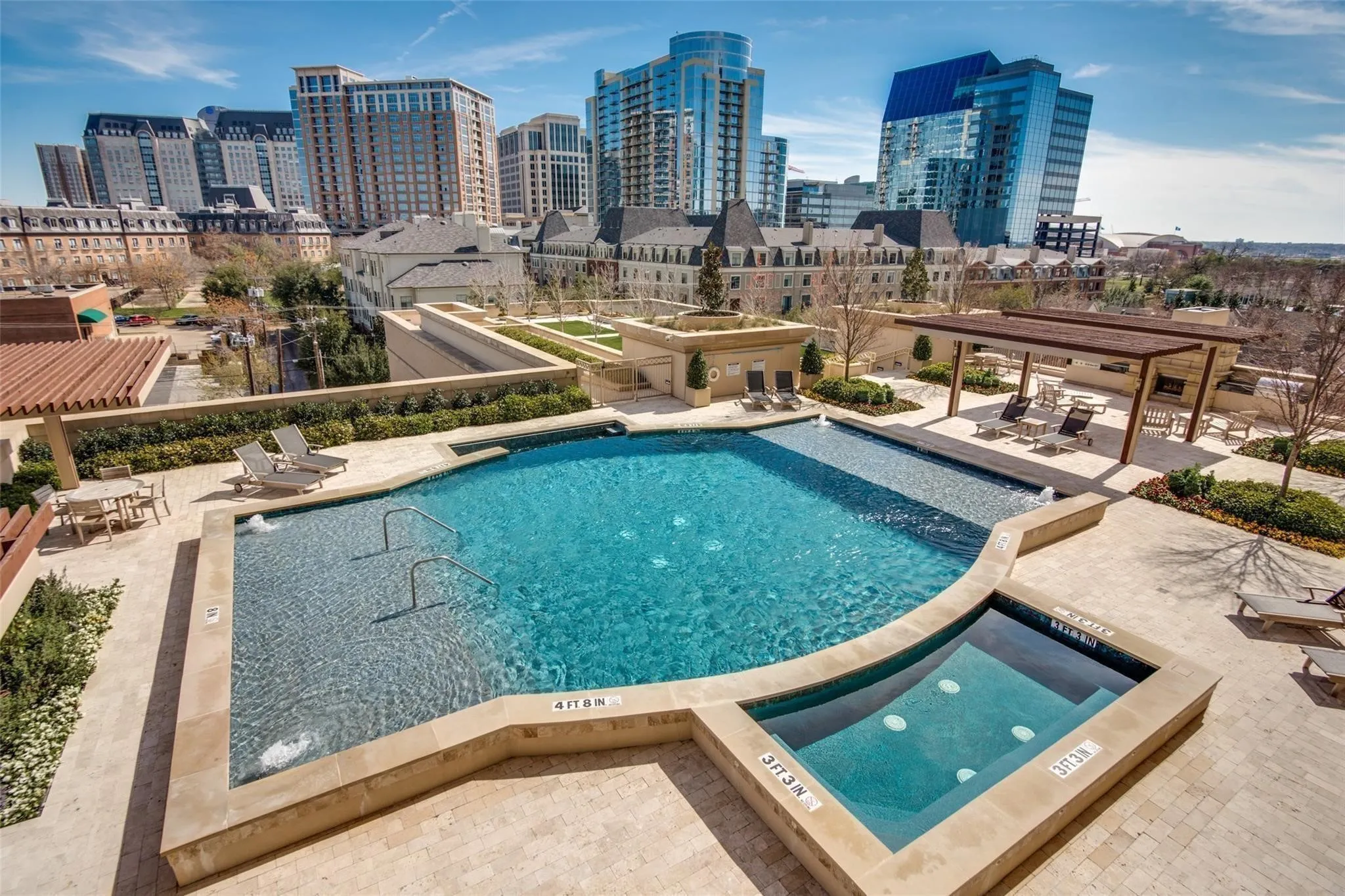 Skyline views are stunning past the pool and spa.