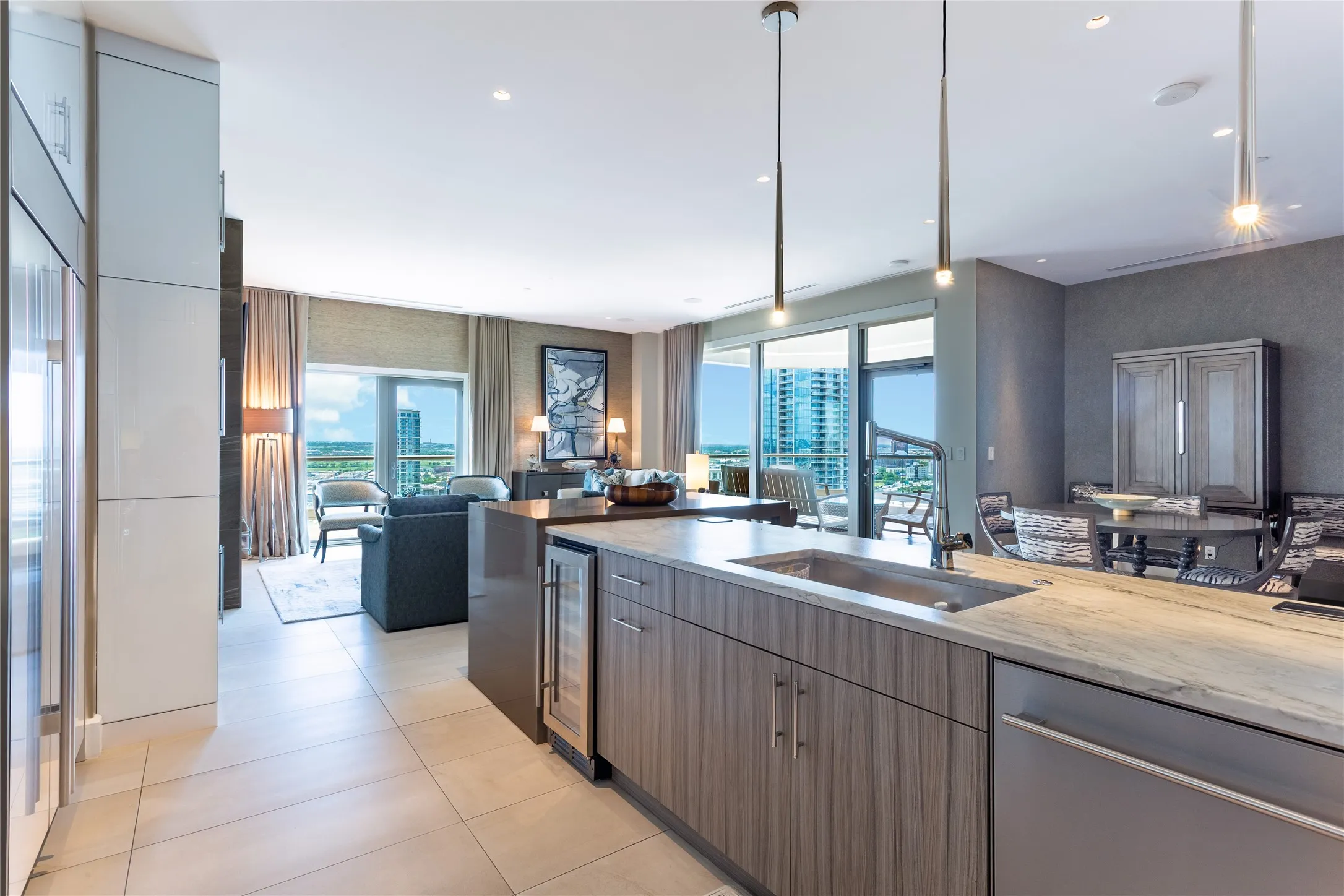 Wine refrigerator, Kohler touchless faucet & custom pendant lighting.