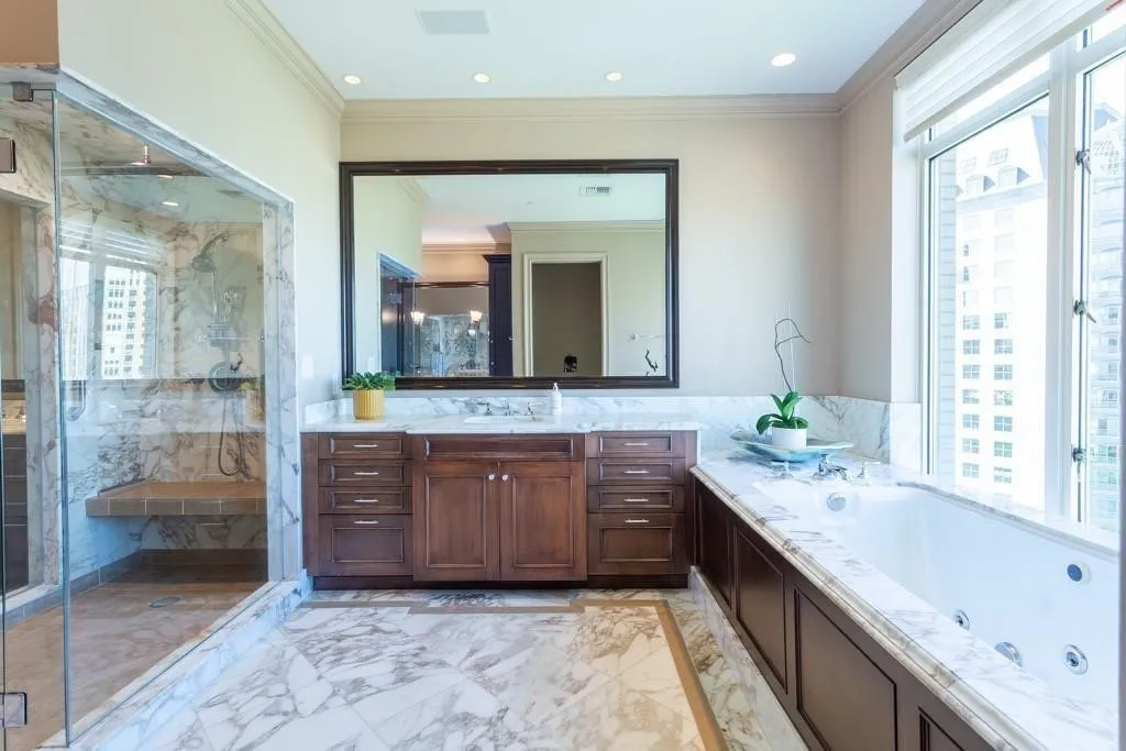 Calacatta Vagli marble floors and counters with Light Smoke Marble accents.
