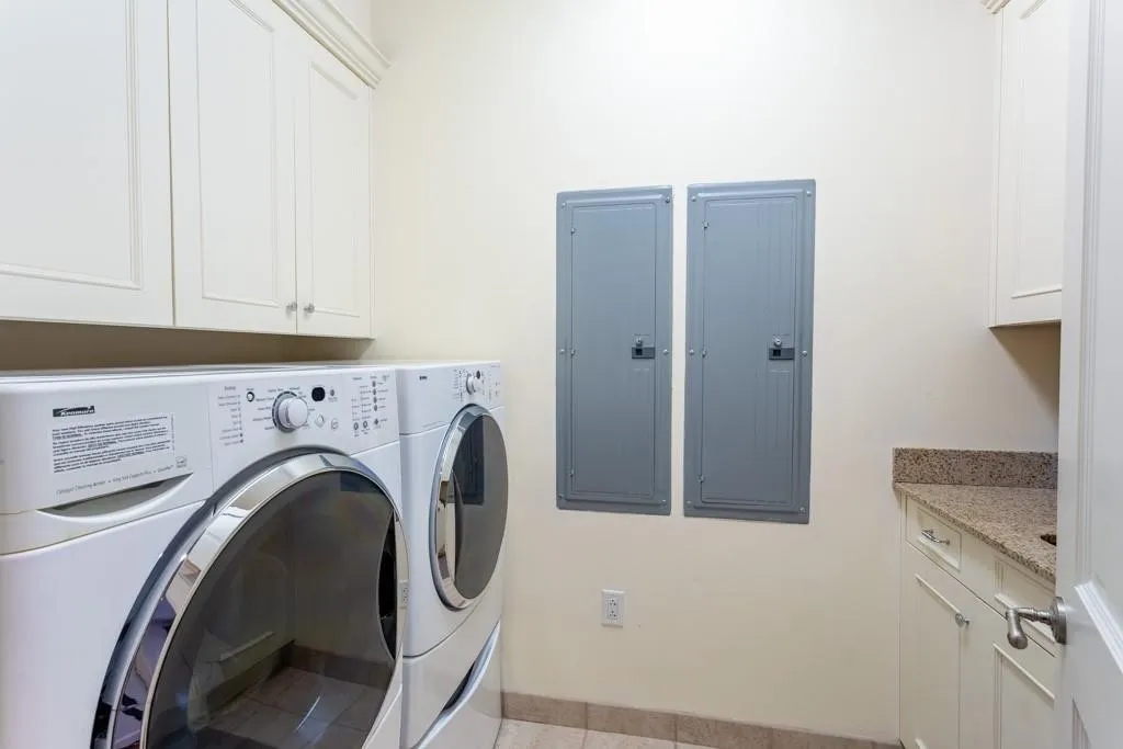 Large Utility Room with sink.