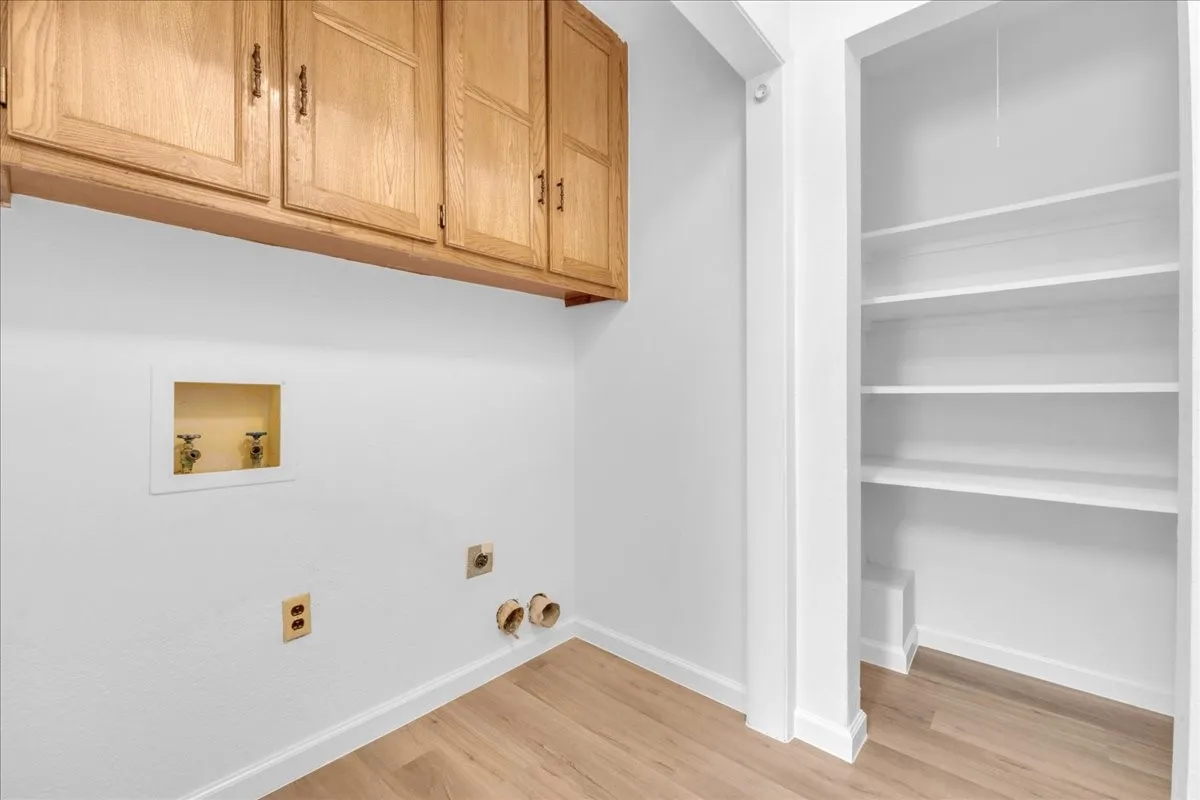 Utility Room with pantry storage & extra cabinetry