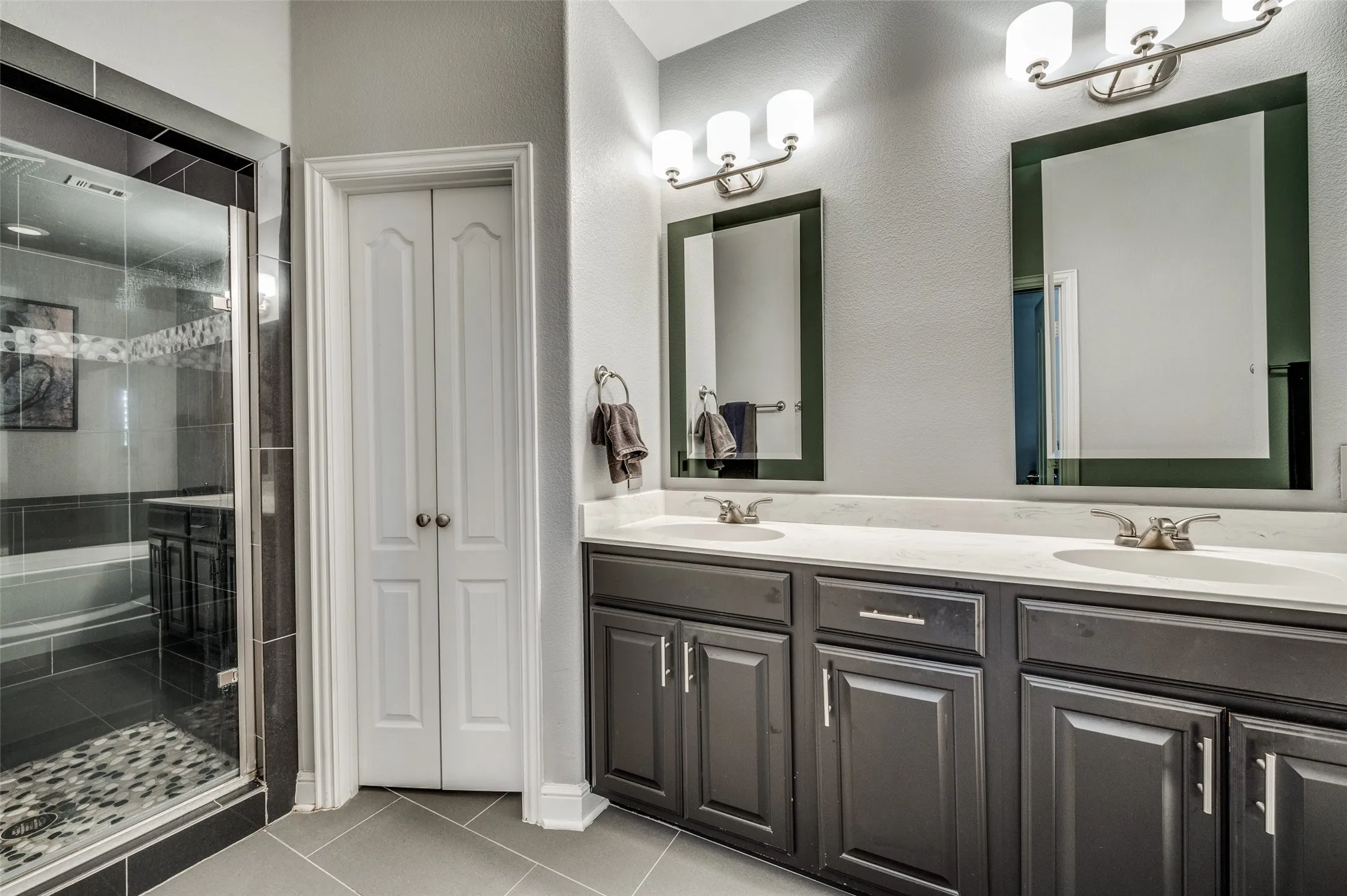 Everything a master bath should be is here: a spa-like feel with a sense of privacy, lots of natural light, an organized layout