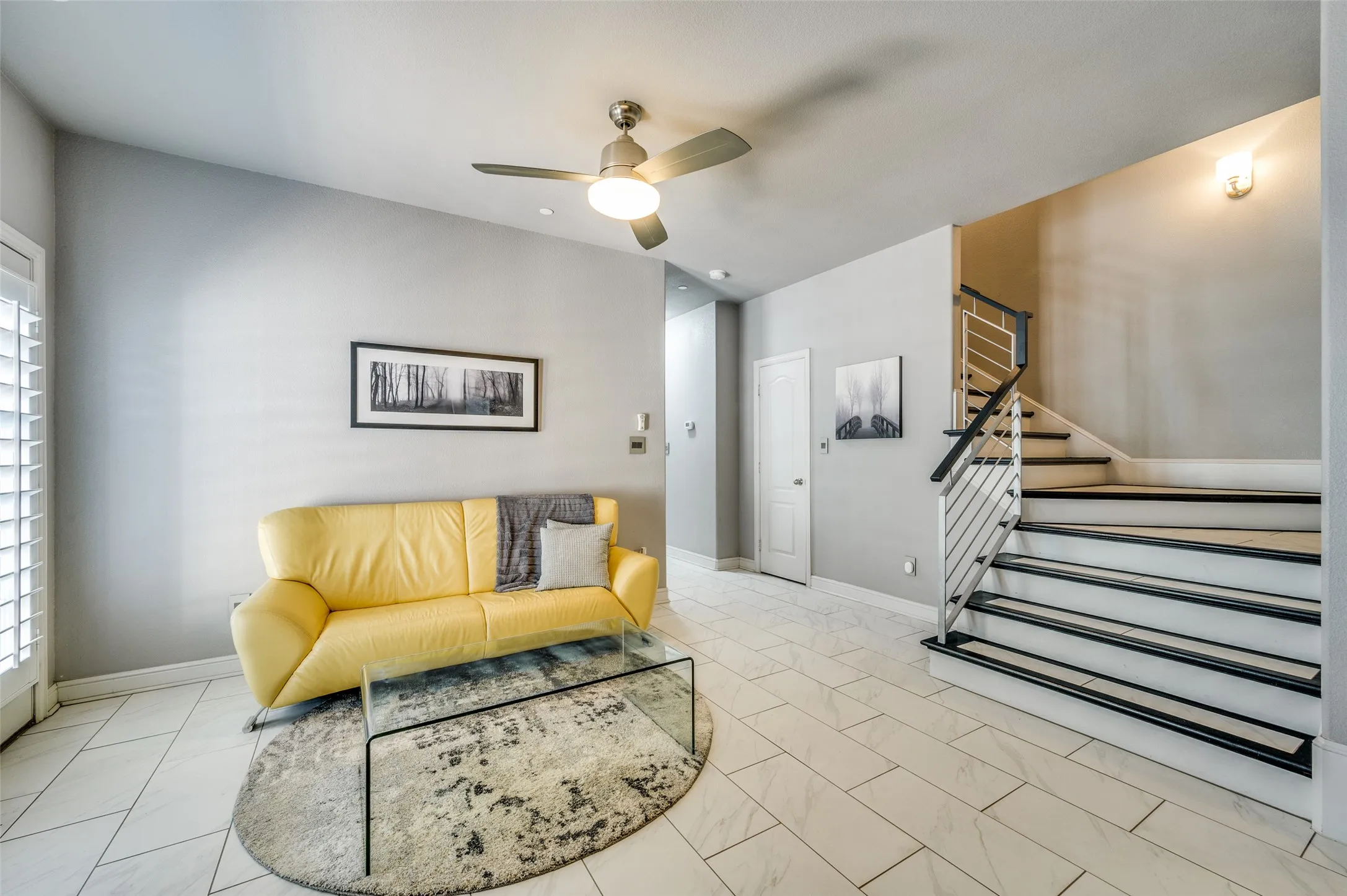 Find your private entrance on the east side of the townhouse with private bedroom with full bath and laundry room with tons of storage.