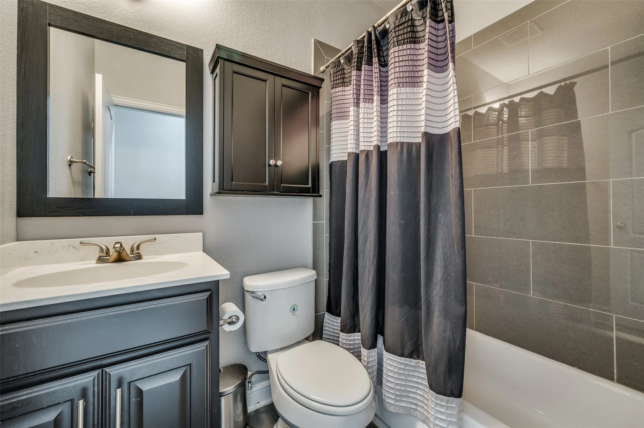 With consistent finishes in all three of the full bathrooms, the 3rd floor secondary bedroom has a full bathroom