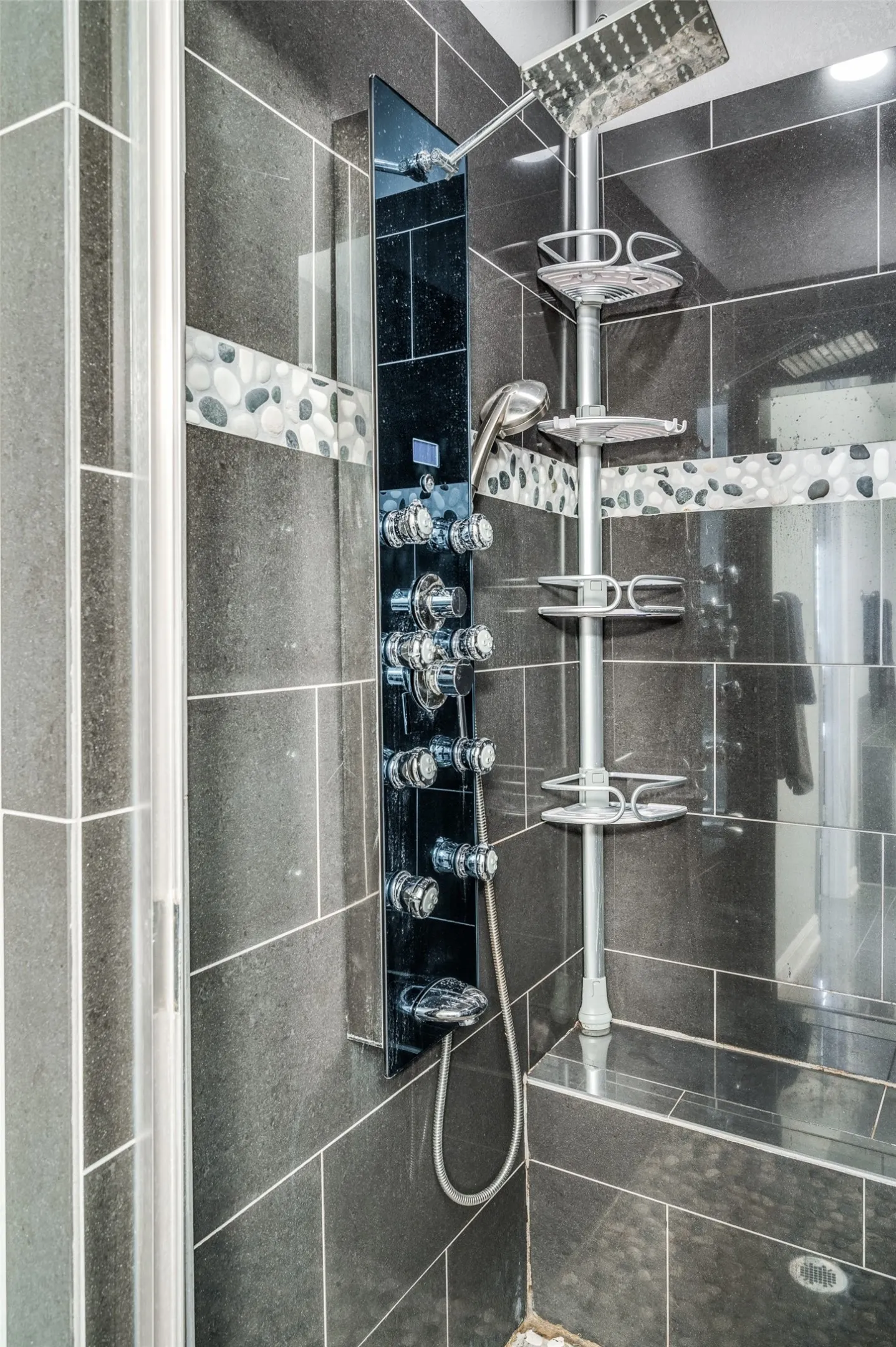 Is there anyone who doesn't absolutely love an oversized shower with dual controls and body spray