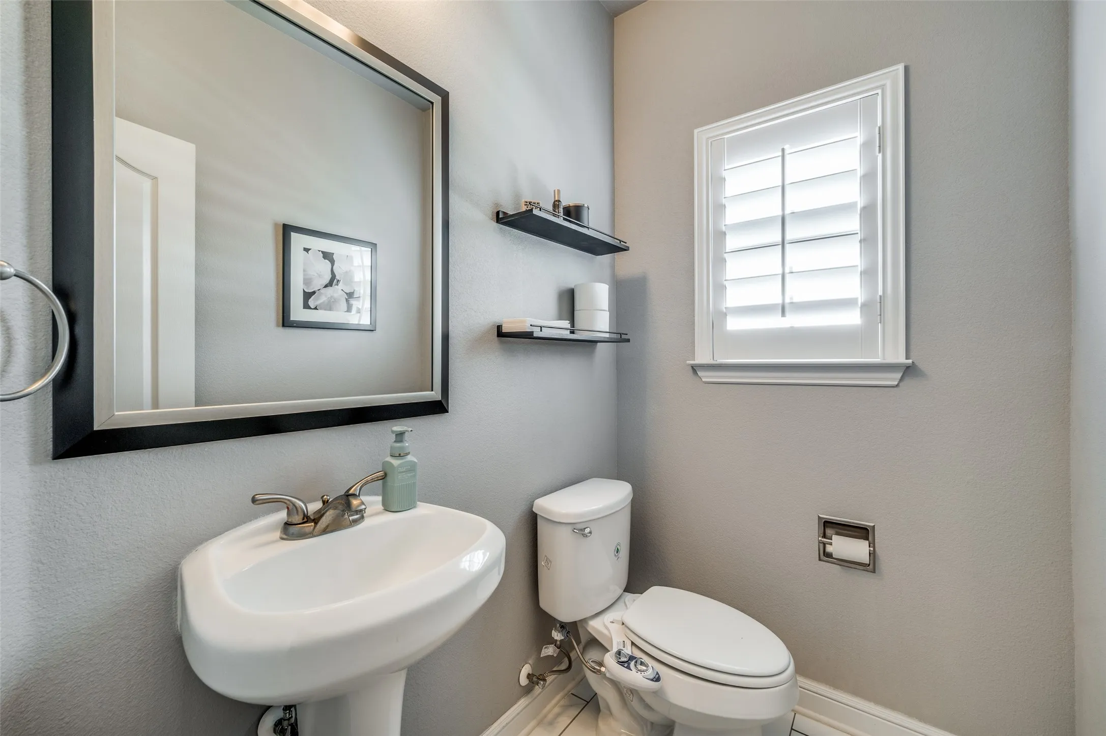 Just around the corner from the main living area is the perky little powder room