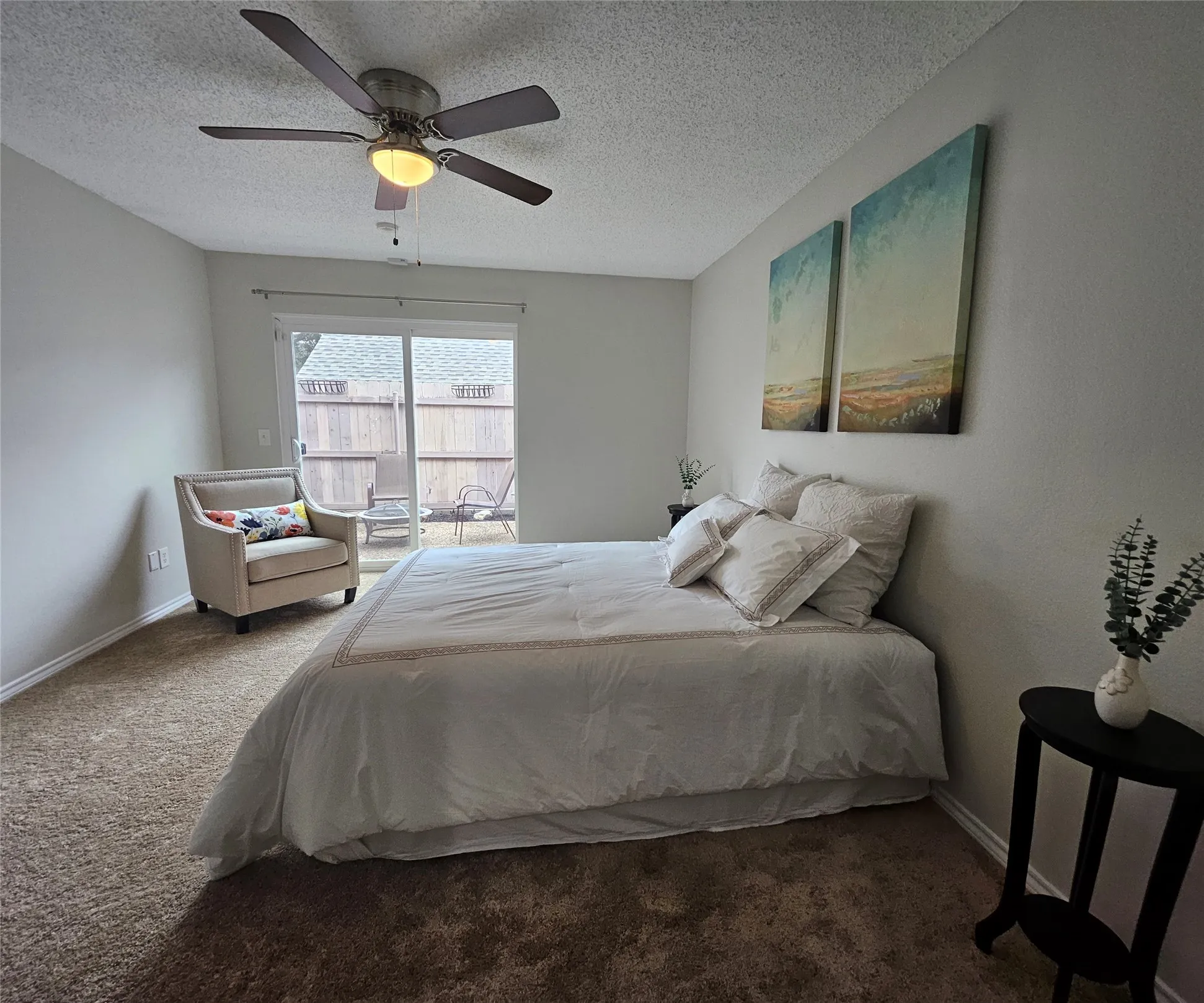 Bedroom featuring carpeted flooring and a ceiling fan