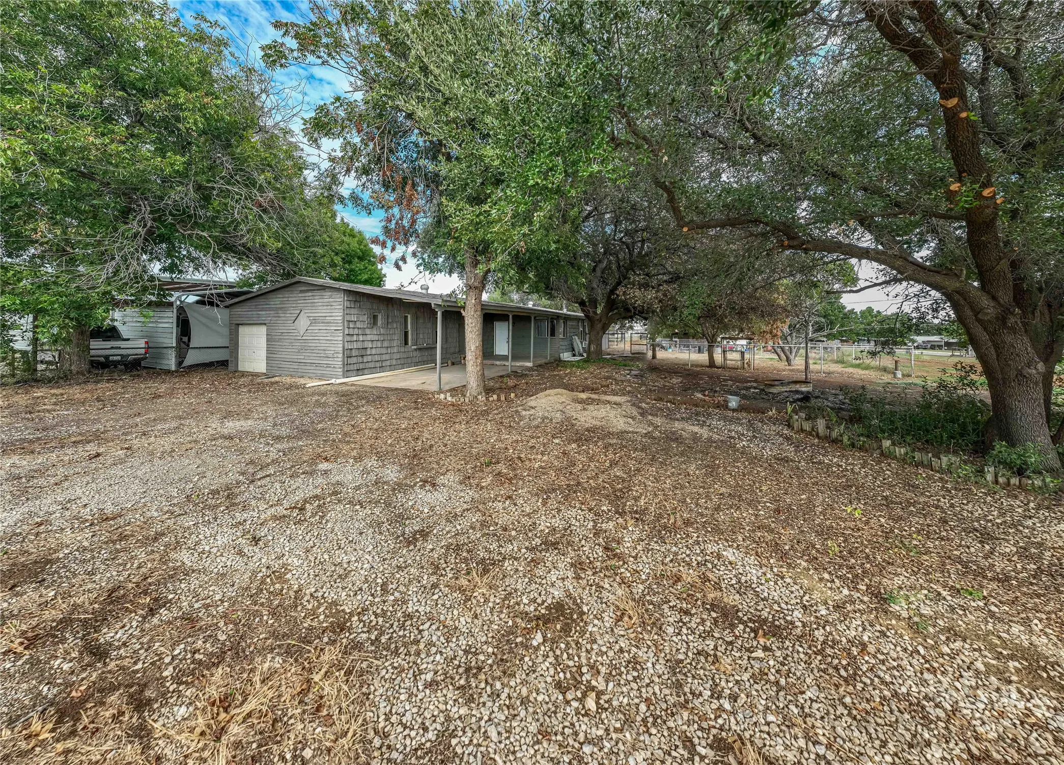 Mobile Home For Sale in Stephens County , 122 County Road 306, Breckenridge, Texas 76424, 4 Bedroom, 2 Bathroom, 1 Garage spaces, 1,696 Sqft, built in 1980, Price $80,000, mls#21309328, Real Estate Agent in Breckenridge, Homes For Sale in Stephens county, Homes For Sale in Breckenridge, Realtor in Breckenridge Texas, Real Estate Brokerage Independent Realty Texas, Luminita Cordes Realtor