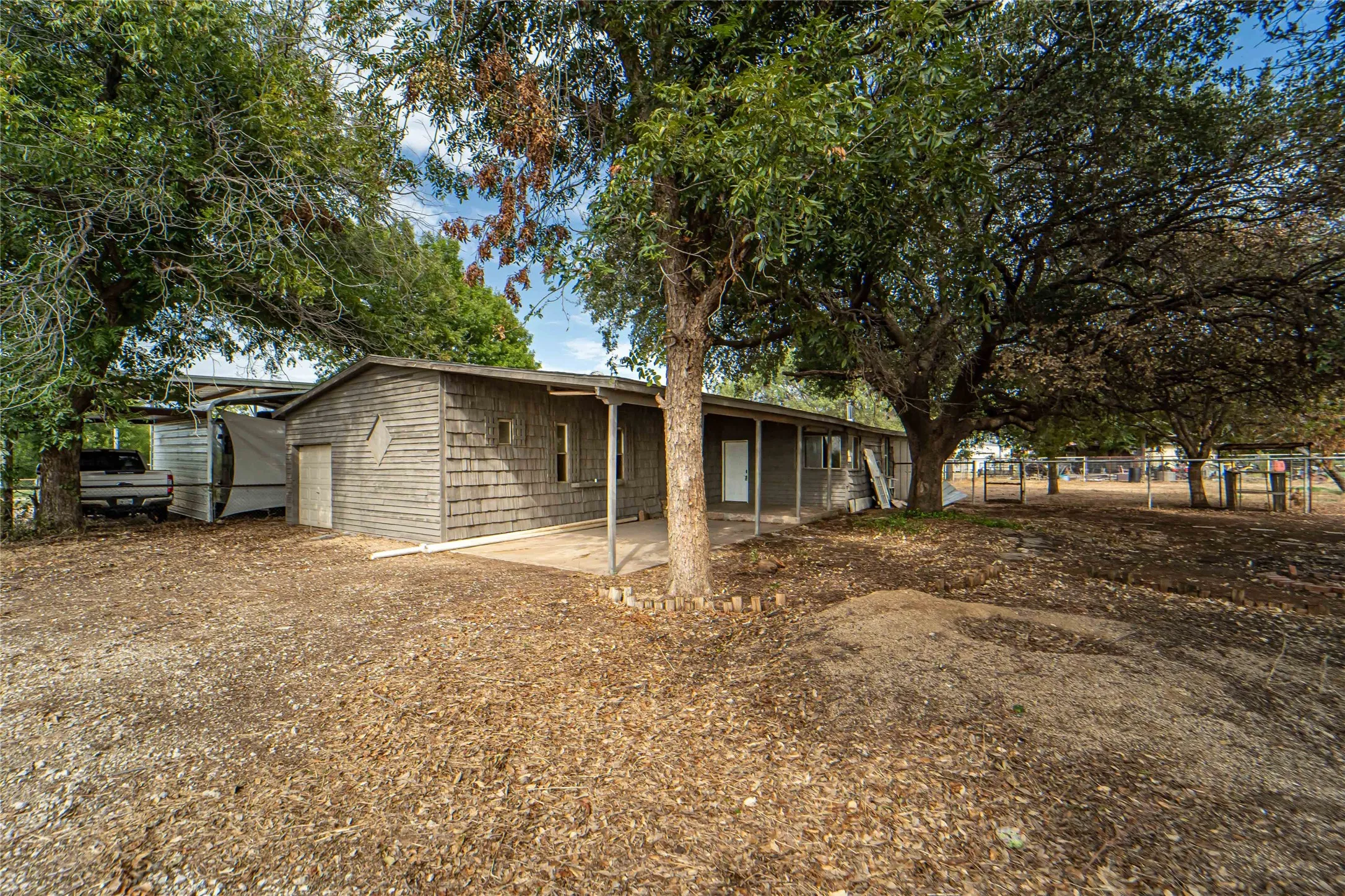 Mobile Home For Sale in Stephens County , 122 County Road 306, Breckenridge, Texas 76424, 4 Bedroom, 2 Bathroom, 1 Garage spaces, 1,696 Sqft, built in 1980, Price $80,000, mls#21309328, Real Estate Agent in Breckenridge, Homes For Sale in Stephens county, Homes For Sale in Breckenridge, Realtor in Breckenridge Texas, Real Estate Brokerage Independent Realty Texas, Luminita Cordes Realtor