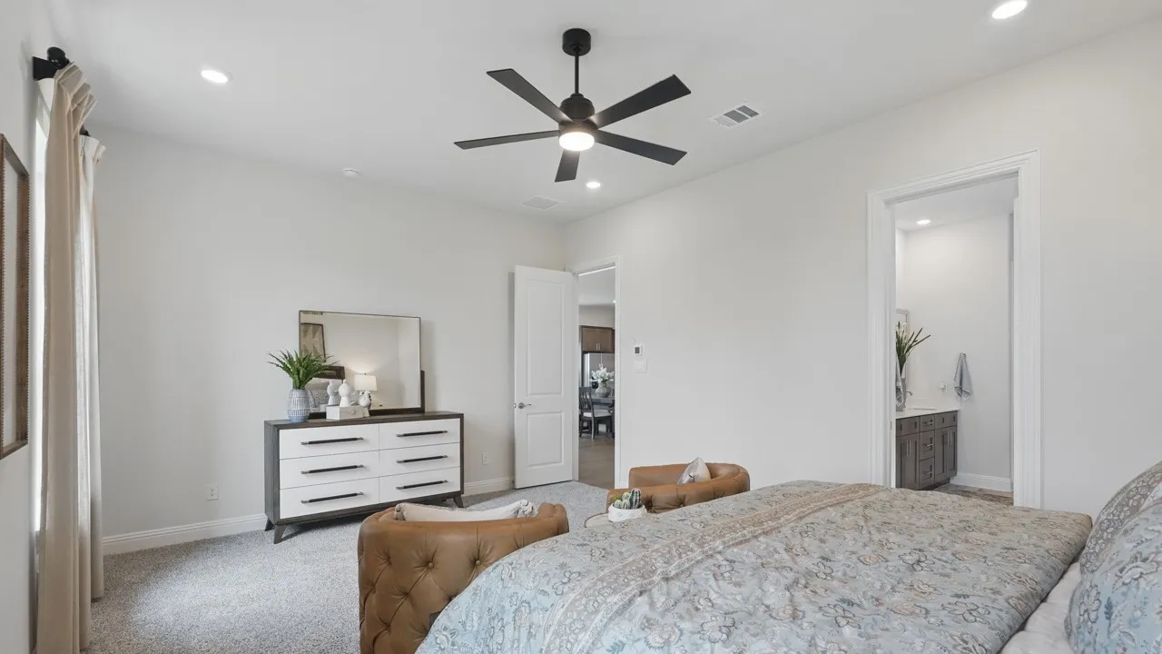 Spacious room featuring neutral paint, recessed lighting, and a ceiling fan