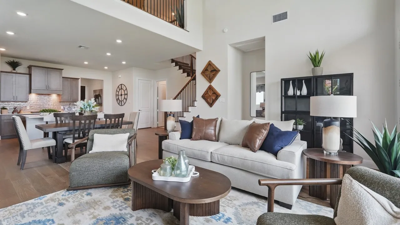 Open-concept living area with wood-finish flooring throughout