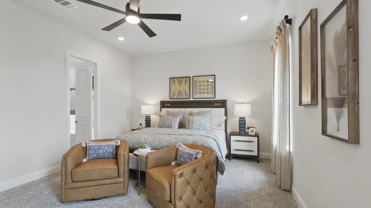 Carpeted room featuring a ceiling fan with integrated lighting, recessed lighting, and a window with drapes