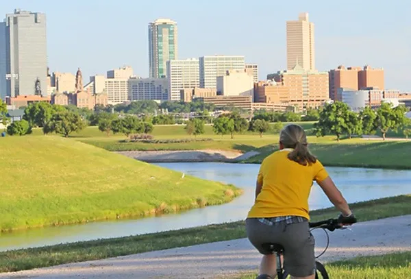 The Trinity Trails offers miles of biking and running trails along the Trinity River and is just a few blocks from the Tower Front Door