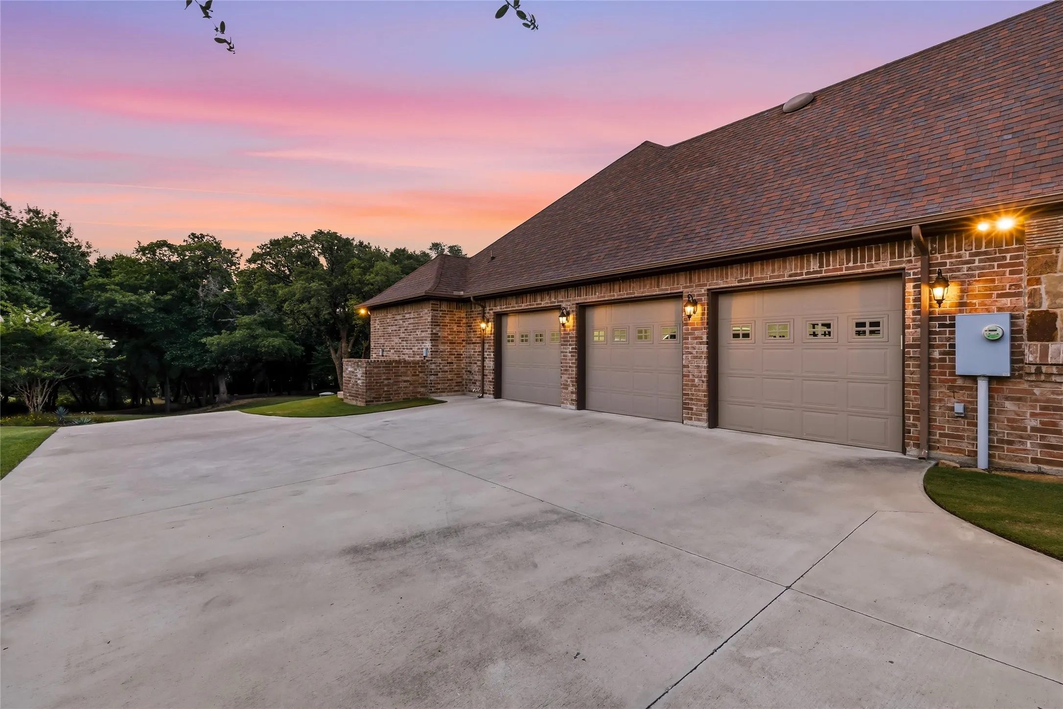 3 car garage and extra poured concrete parking area, plenty of room to play