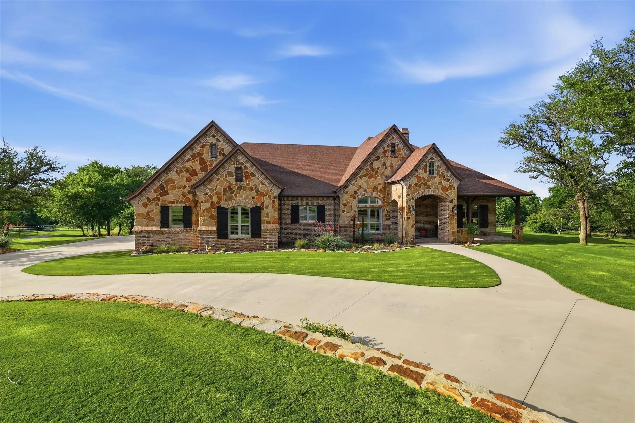 Gorgeous custom built home with Stone exterior