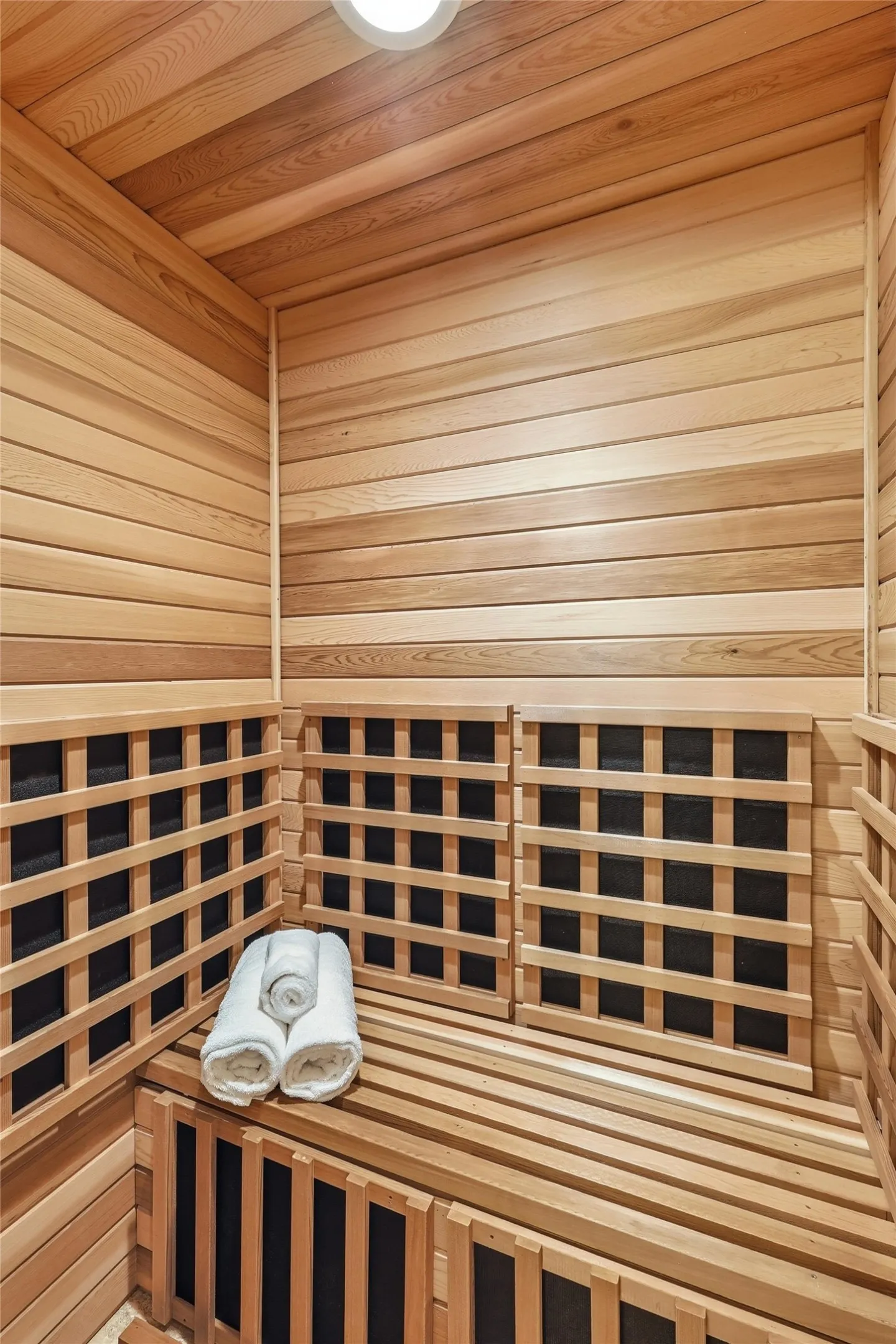 Dedicated sauna room located inside the primary bathroom