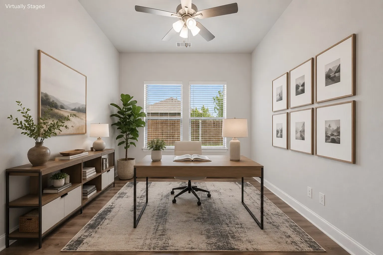 Bright room featuring wood-finish flooring, two windows with blinds, a ceiling fan with integrated lighting, and white baseboards