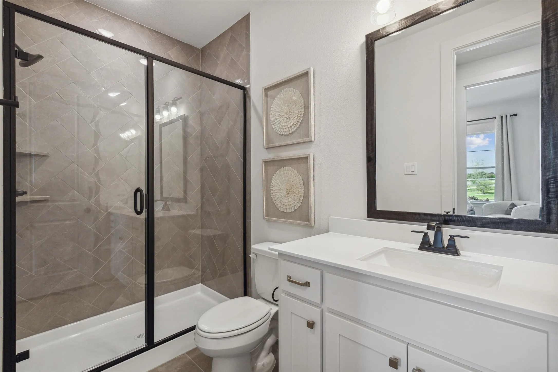 Friends and family will feel right at home in any of the lovely guest baths.