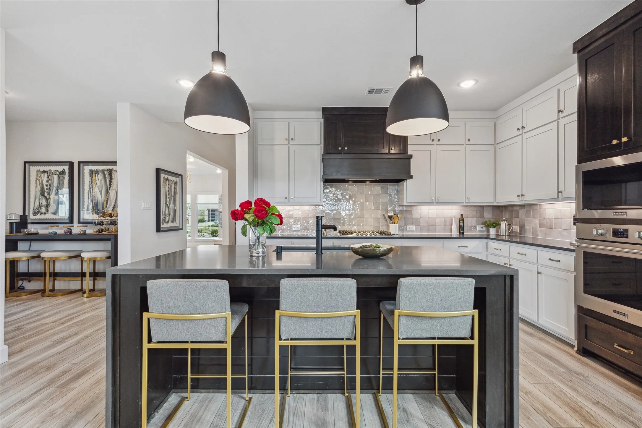 This elegant kitchen island is the perfect place for friends and family to gather round!