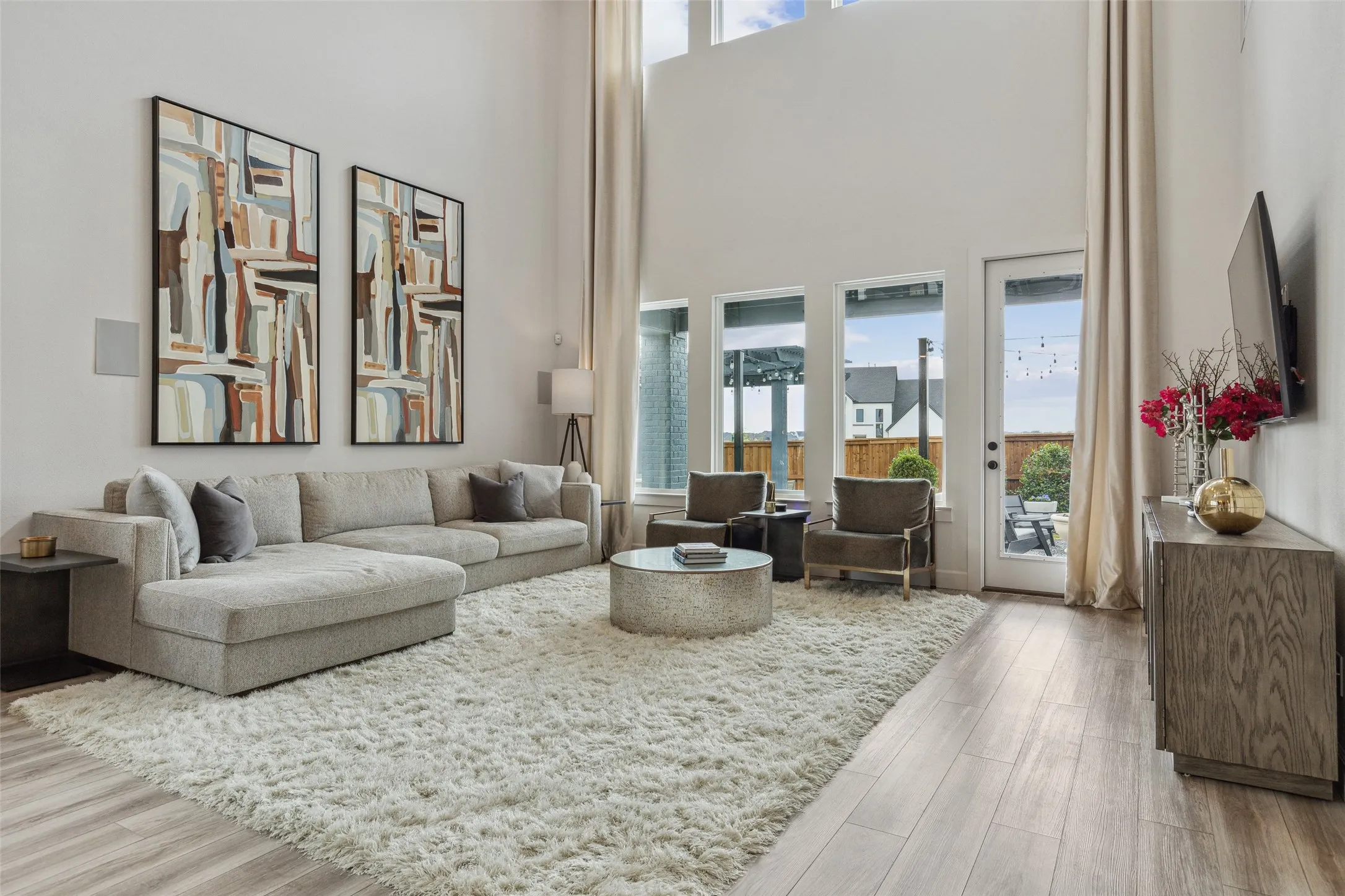 Beautiful flooring, high ceilings and a wall of windows....this dream home has it all!