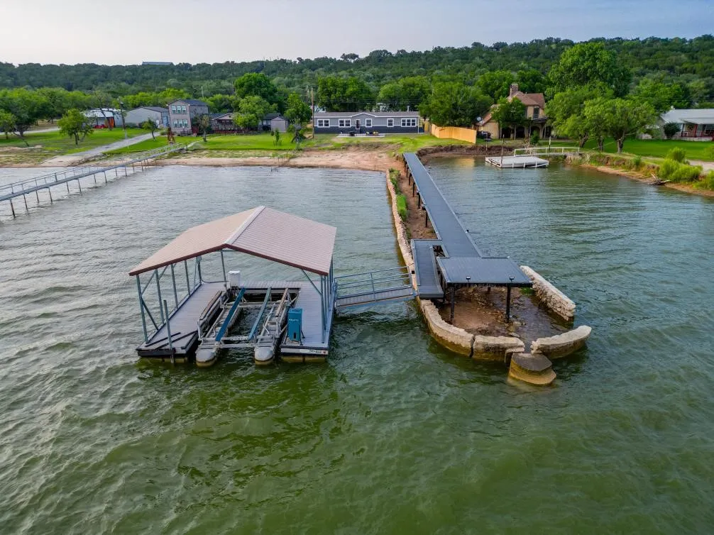 Single Family Residence For Sale in Palo Pinto County , 4445 Chapel Road, Possum Kingdom Lake, Texas 76450, 4 Bedrooms, 2 Bathrooms, Garage spaces, 2,340 Sqft, built in 2026, Price $999,999, mls#21306605, Real Estate Agent in Possum Kingdom Lake, Homes For Sale in Palo Pinto county, Homes For Sale in Possum Kingdom Lake, Realtor in Possum Kingdom Lake Texas, Real Estate Brokerage Independent Realty Texas, Luminita Cordes Realtor