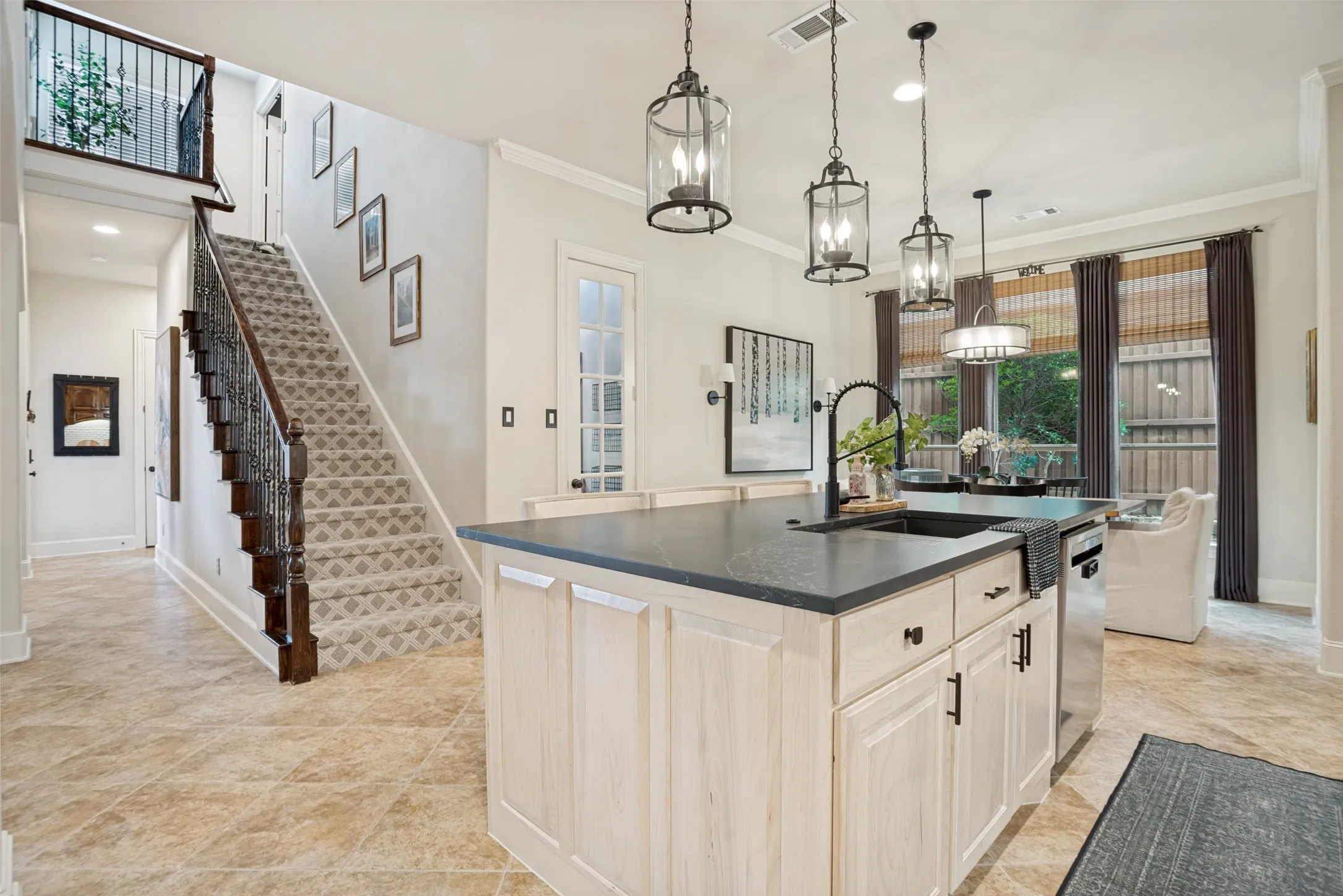 New kitchen island with sealed natural hardwood and updated quartzite countertop and farmhouse sink