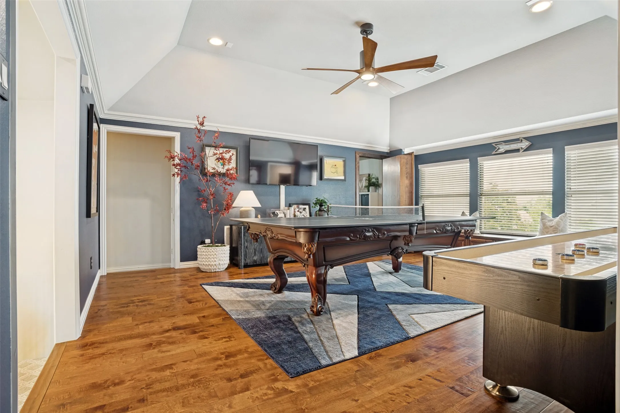 Large second floor gameroom with wood floors