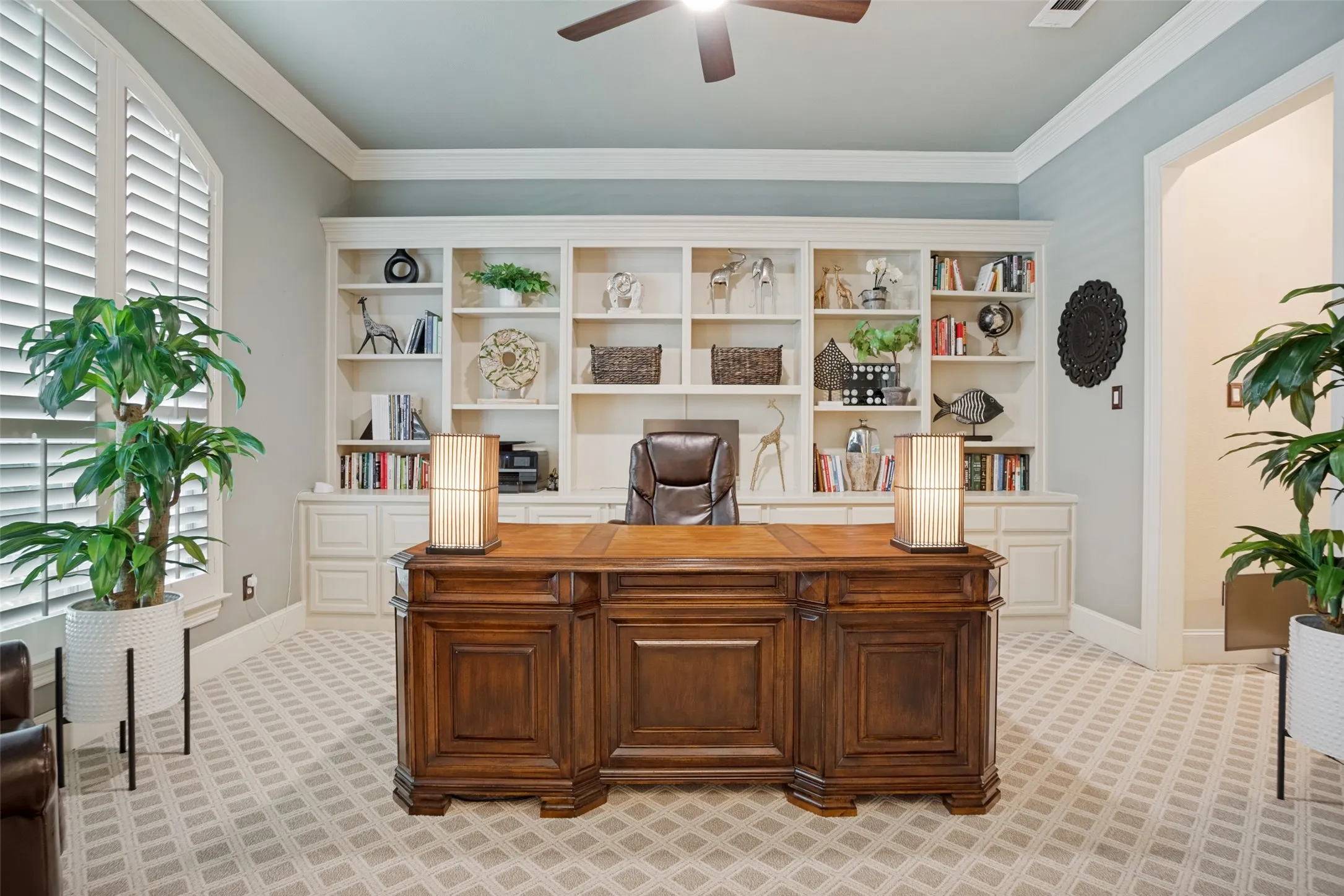 Executive office with built-in cabinets