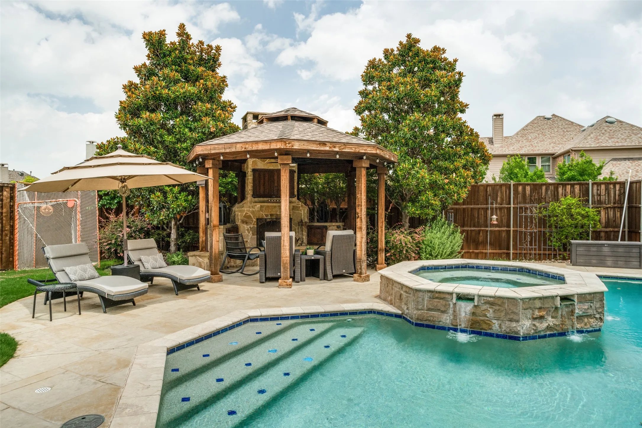 Oversized 8 foot deep pool resurfaced within the last few years; gazebo with wood burning fireplace
