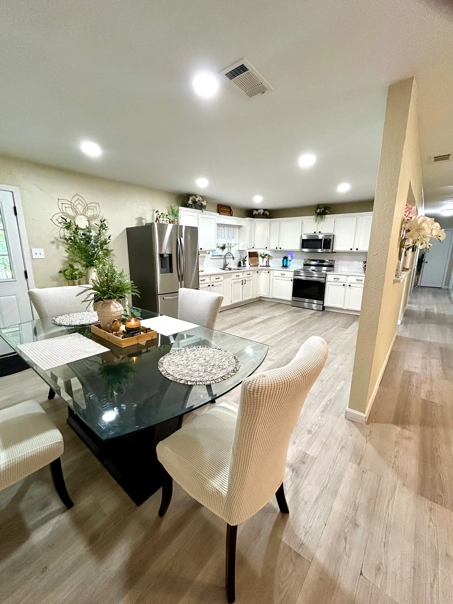 Dining space featuring light wood-style flooring and recessed lighting