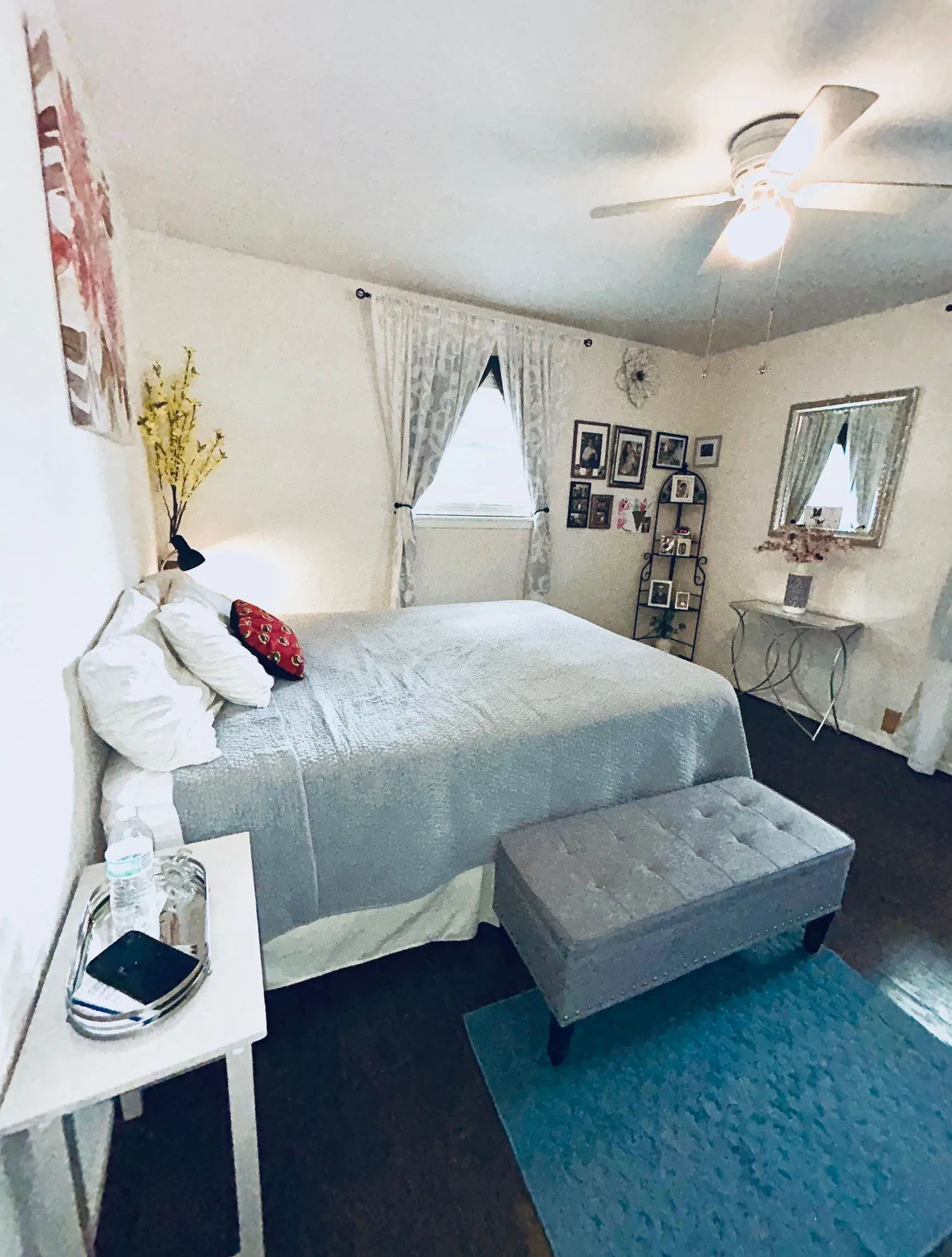 Bedroom featuring wood finished floors and ceiling fan