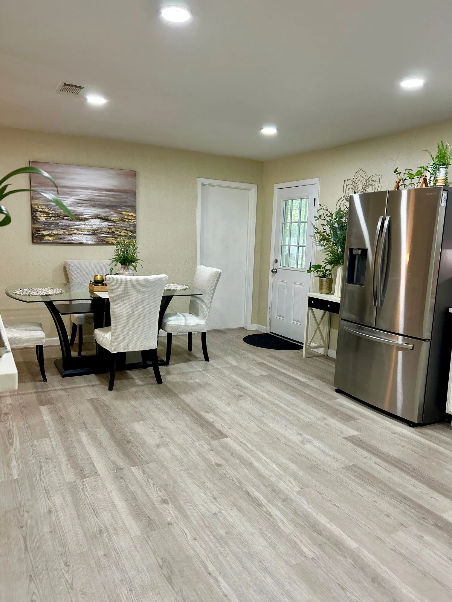 Dining area featuring light wood-style flooring and recessed lighting