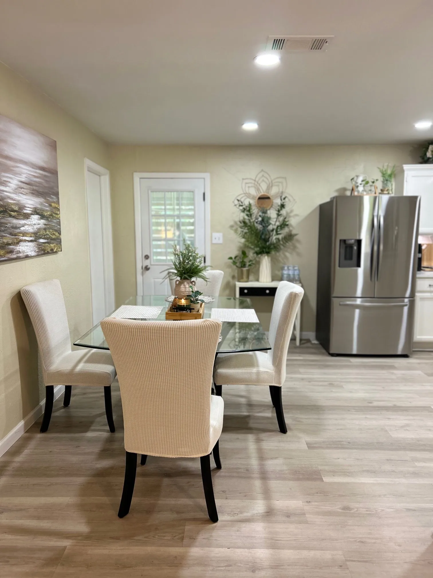 Dining room featuring light wood-style floors and recessed lighting