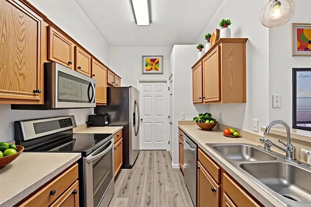 Galley Kitchen with utility room at the end.