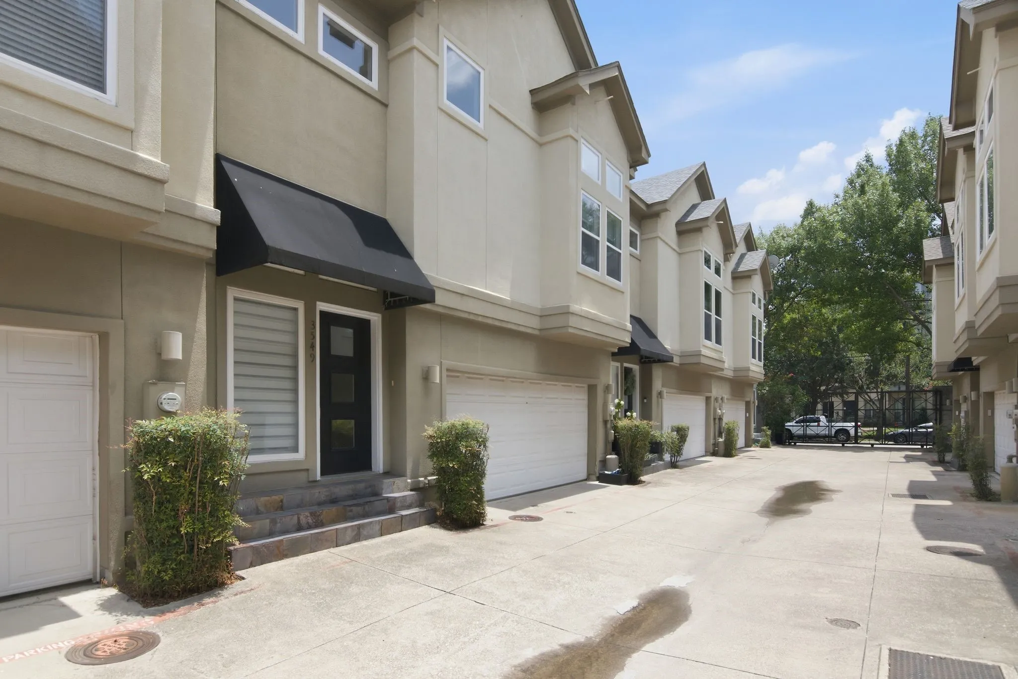 Welcome to 3549 Wheeler! Contemporary 2 tone Stucco facade featuring an awning over the entry, and ground-level garage access