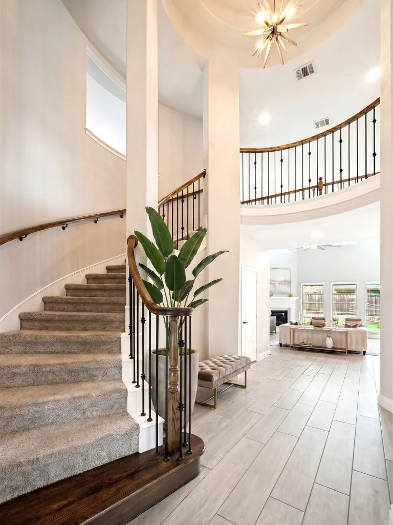 Elegant, curved staircase and rotunda
