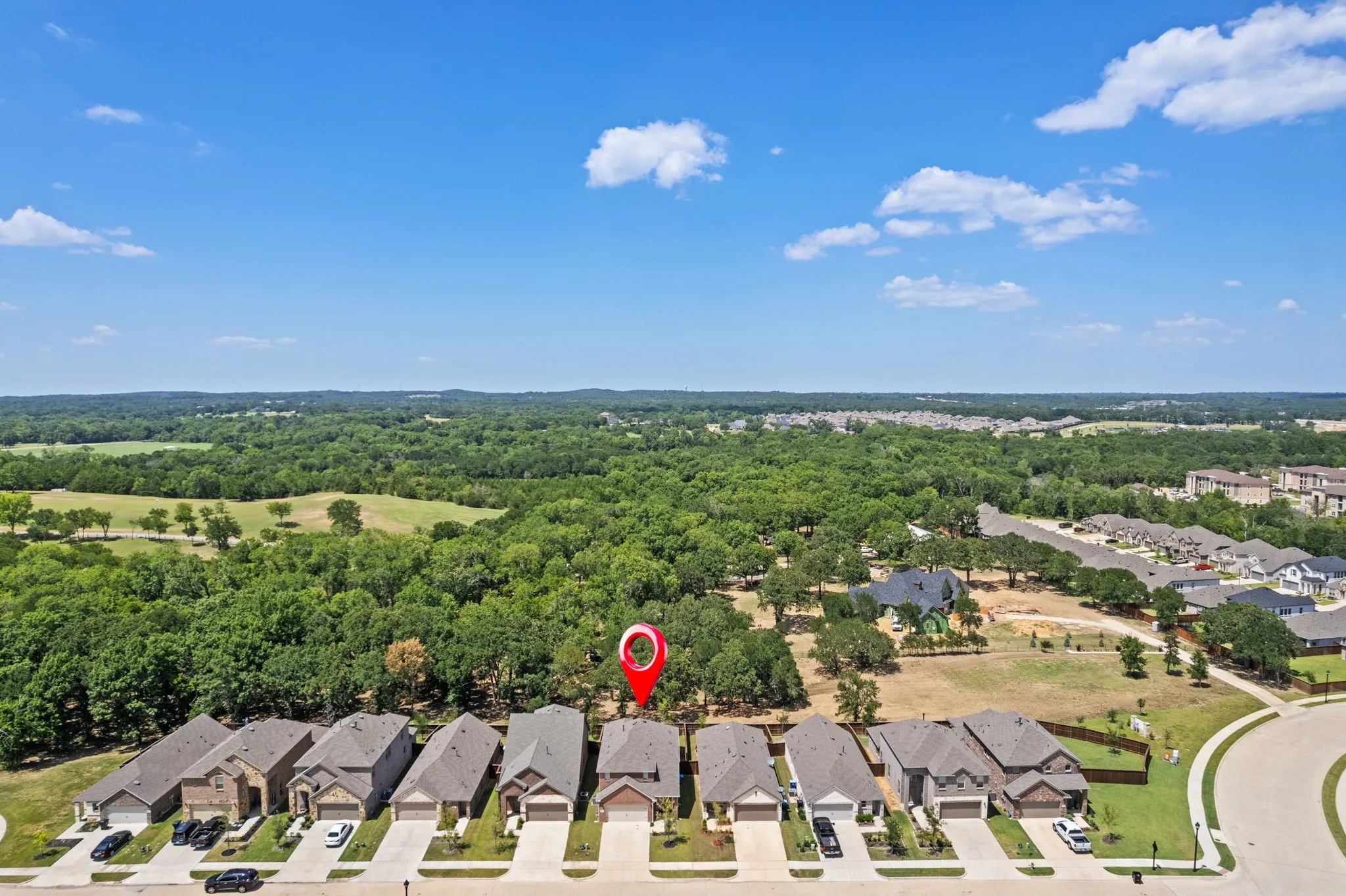 Aerial view showcasing property location and surrounding area.