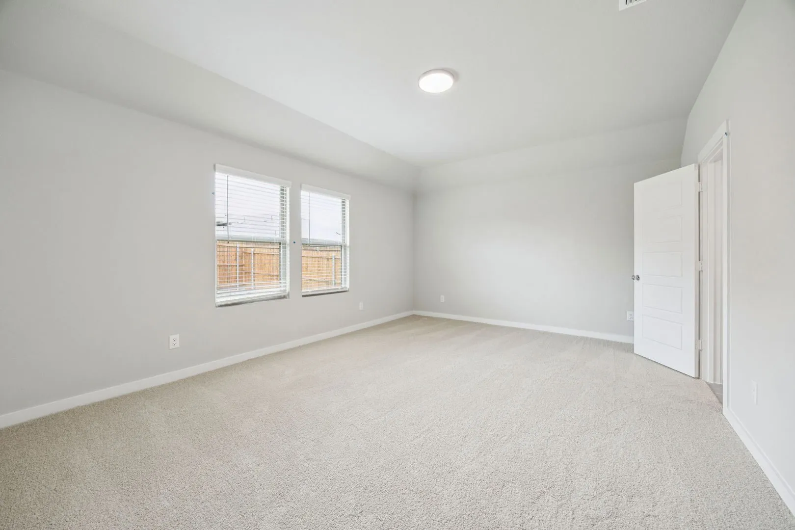 Primary Suite in the Hayden home plan by Trophy Signature Homes – REPRESENTATIVE PHOTO