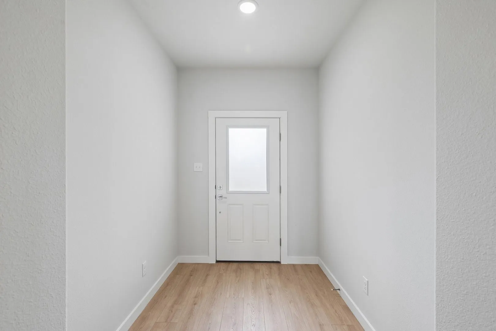 Foyer in the Hayden home plan by Trophy Signature Homes