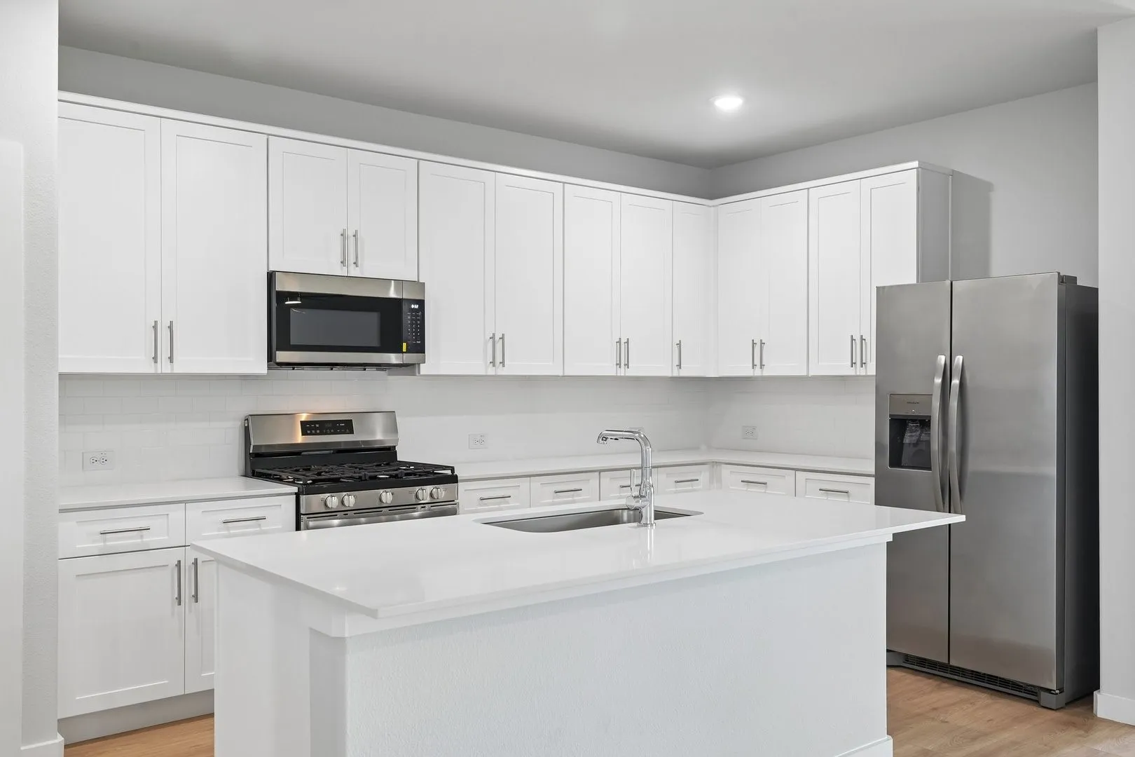 Kitchen in the Hayden home plan by Trophy Signature Homes