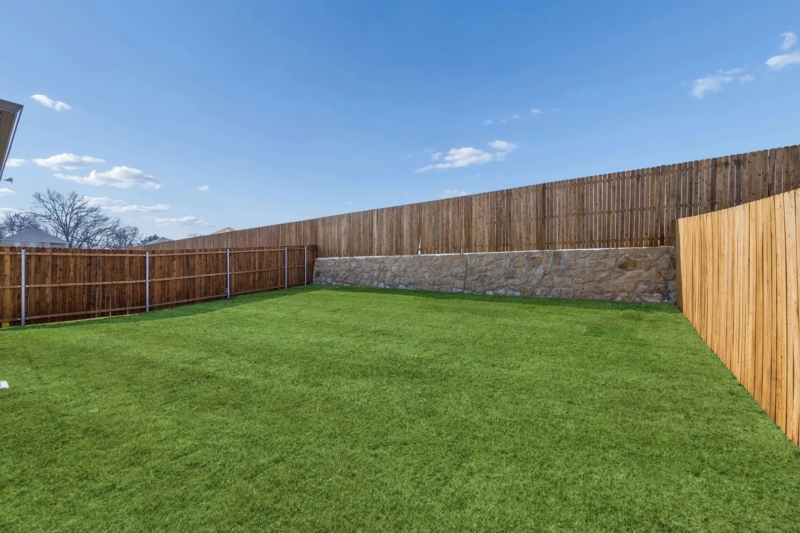 Covered Patio in the Willow home plan by Trophy Signature Homes – REPRESENTATIVE PHOTO