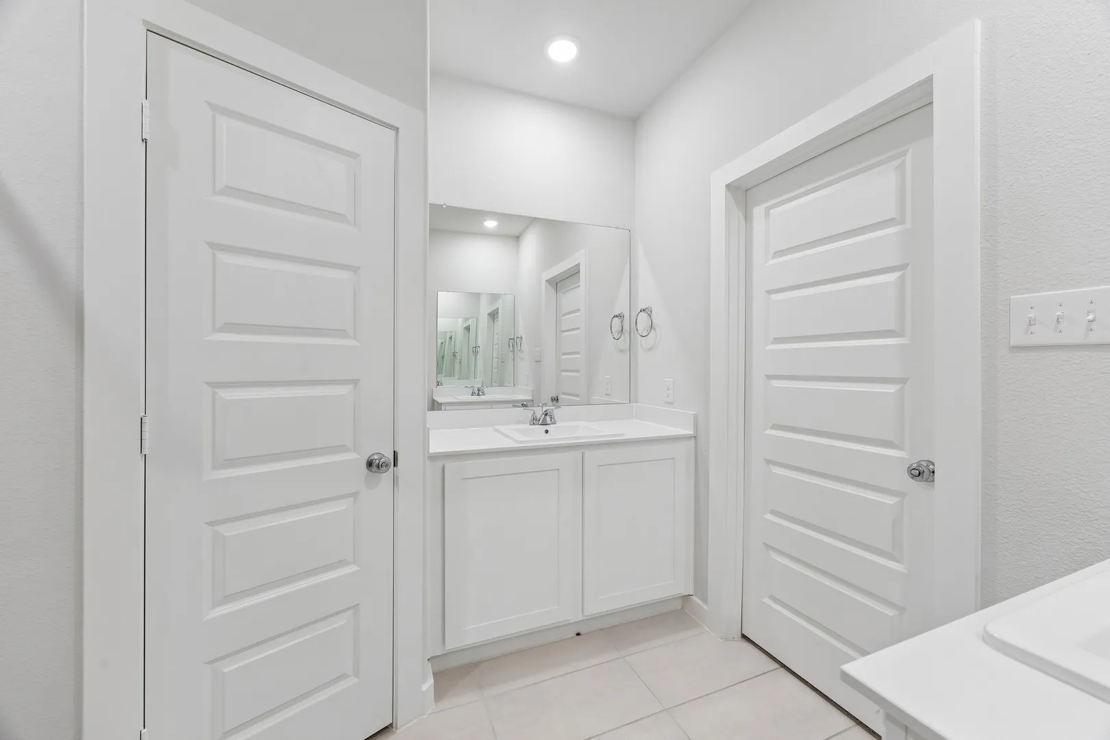 Primary Bathroom in the Cedar home plan by Trophy Signature Homes – REPRESENTATIVE PHOTO