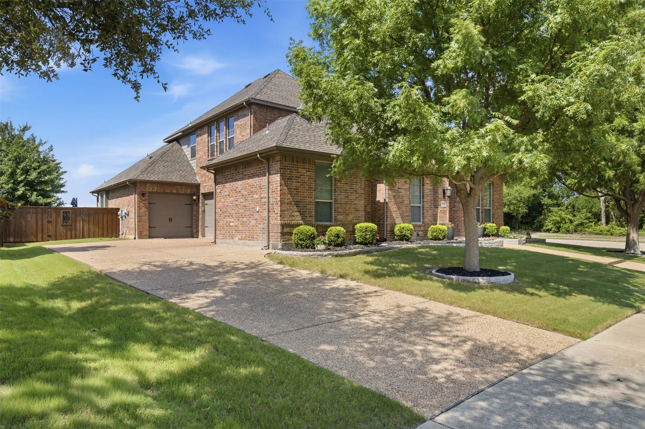 Spacious side-entry three-car garage providing additional parking, storage, and an attractive front elevation.